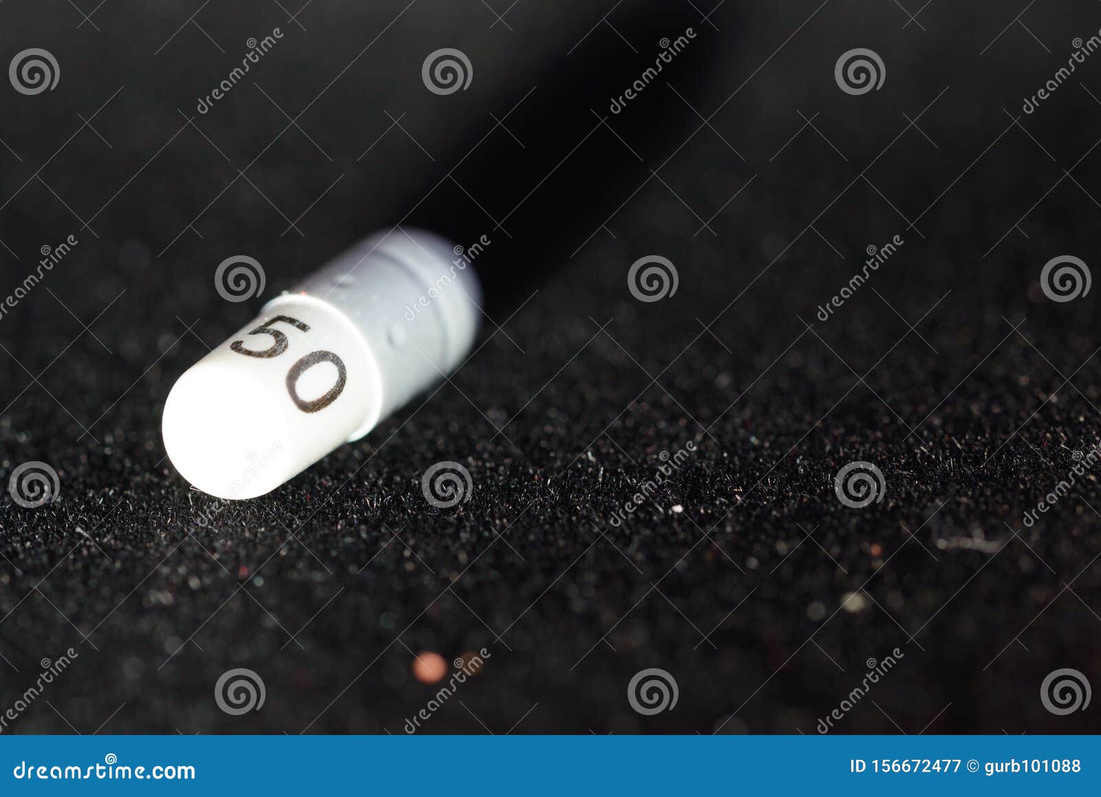 white and grey capsules with 50 number
