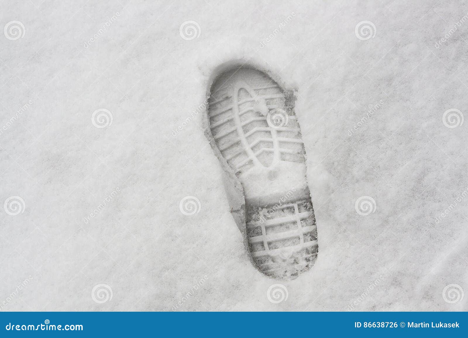 Hard Shoe Footprint on White Snow Surface in Winter Stock Photo - Image ...