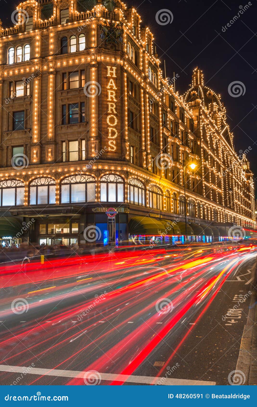 Harrods Store in London, UK with Christmas Decorations Editorial ...