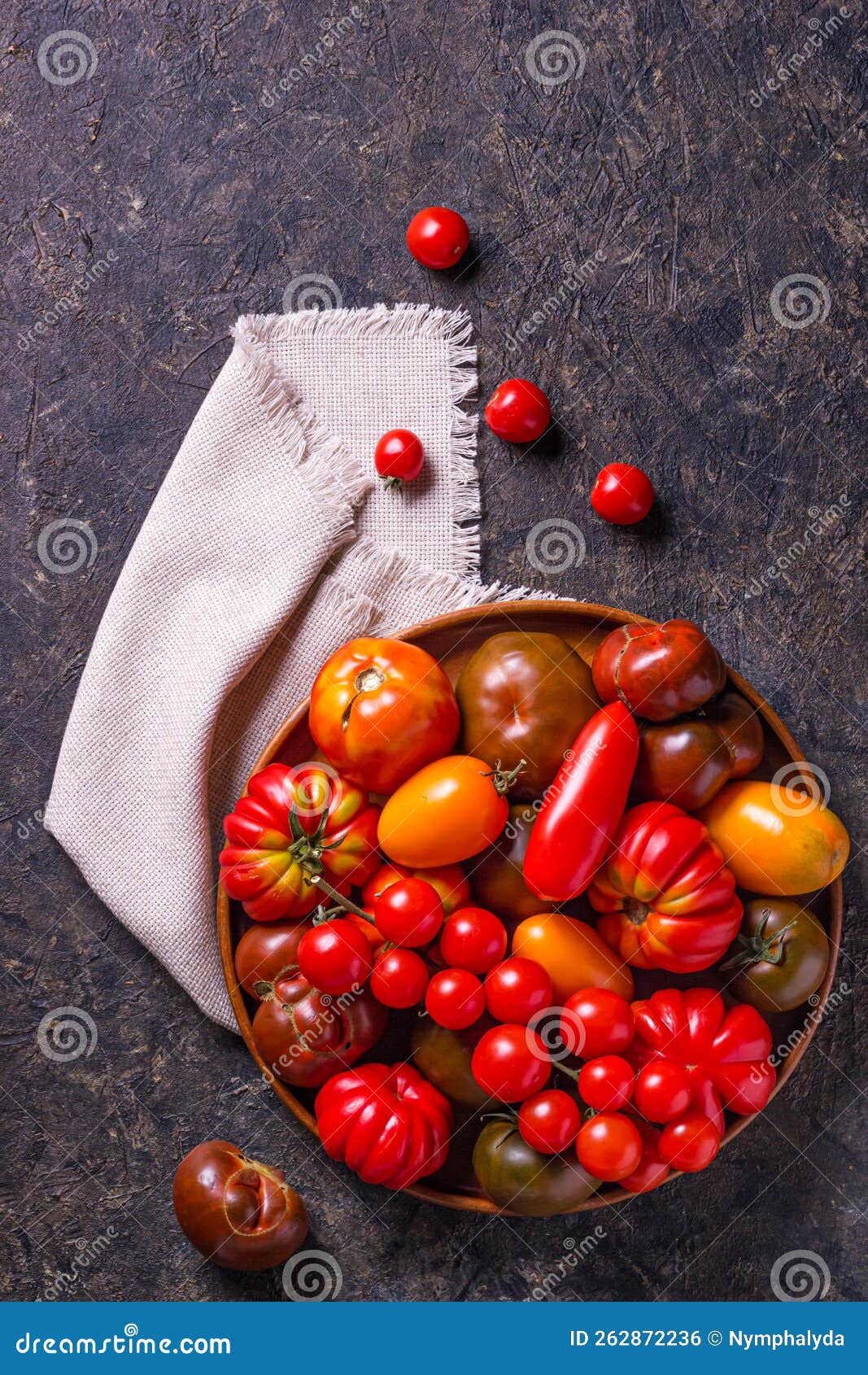 The Harvest of Assorted Tomatoes. Colorful Organic Tomatoes on a Large