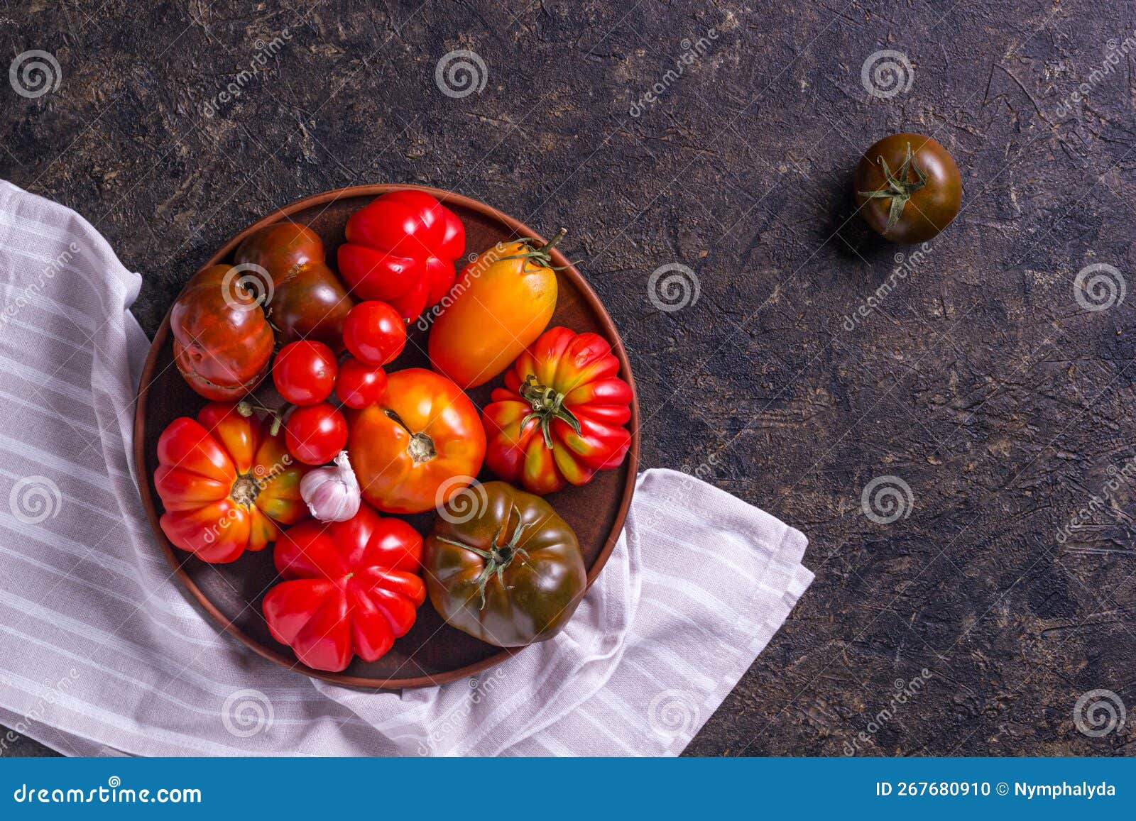 The Harvest of Assorted Tomatoes. Colorful Organic Tomatoes on a Large
