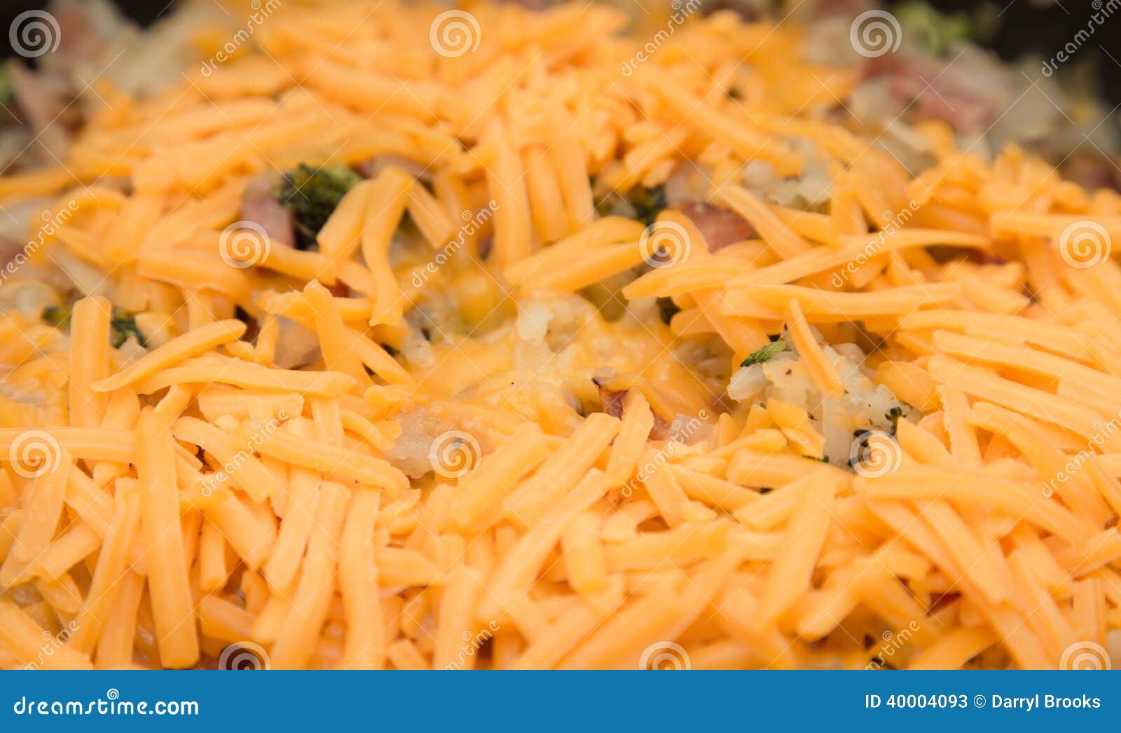 Hash Browns with Ham and Broccoli Covered Wtih Cheese Stock Image