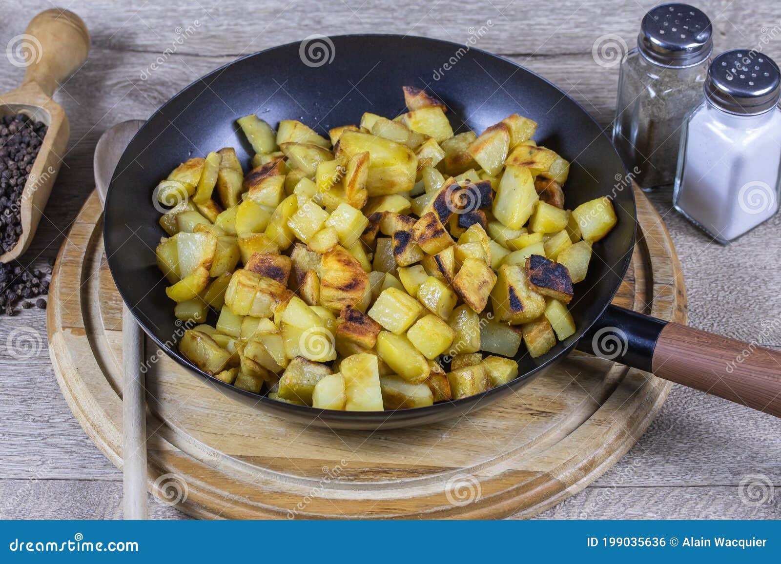 Hash browns in a pan stock photo. Image of cubes, dish 199035636