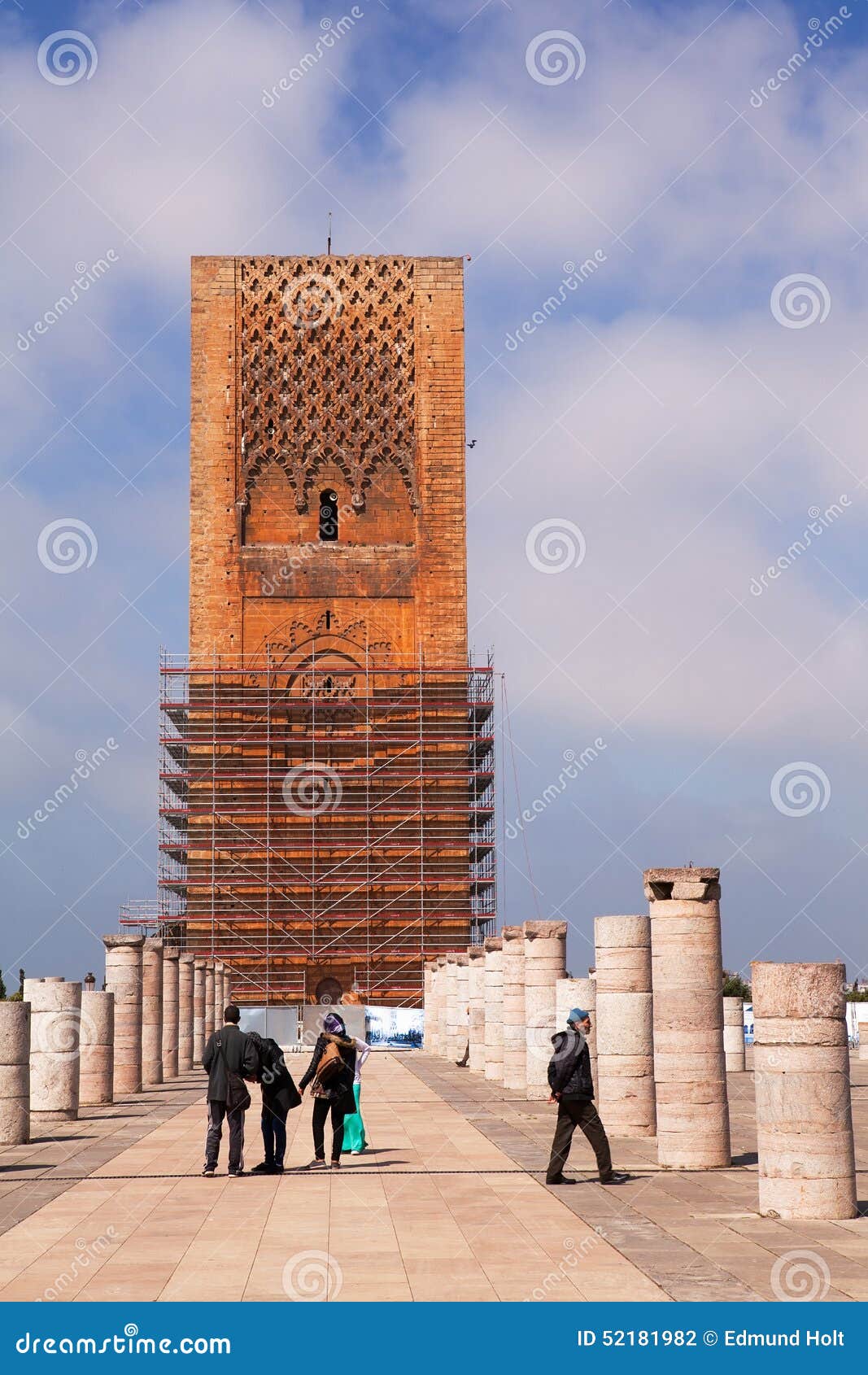 Hassan Tower and Pillars of Rabat s Unfinished Mosque. Visitors to the unfinished mosque and minaret of Rabat, Morocco. Construction began in 1195 and was abandoned in 1199