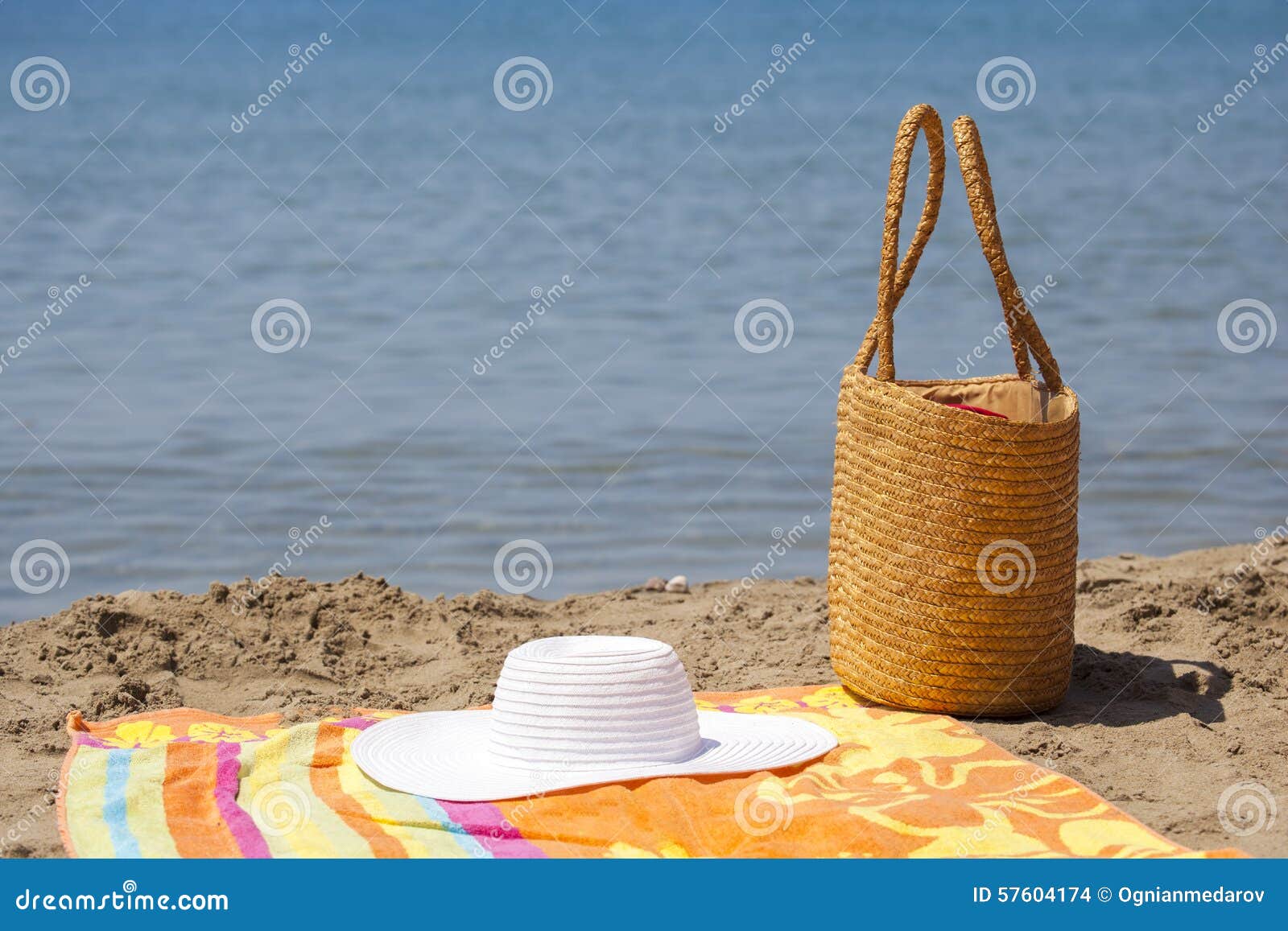 Hat Bag and Towel on the Beach Stock Photo - Image of leisure, close ...