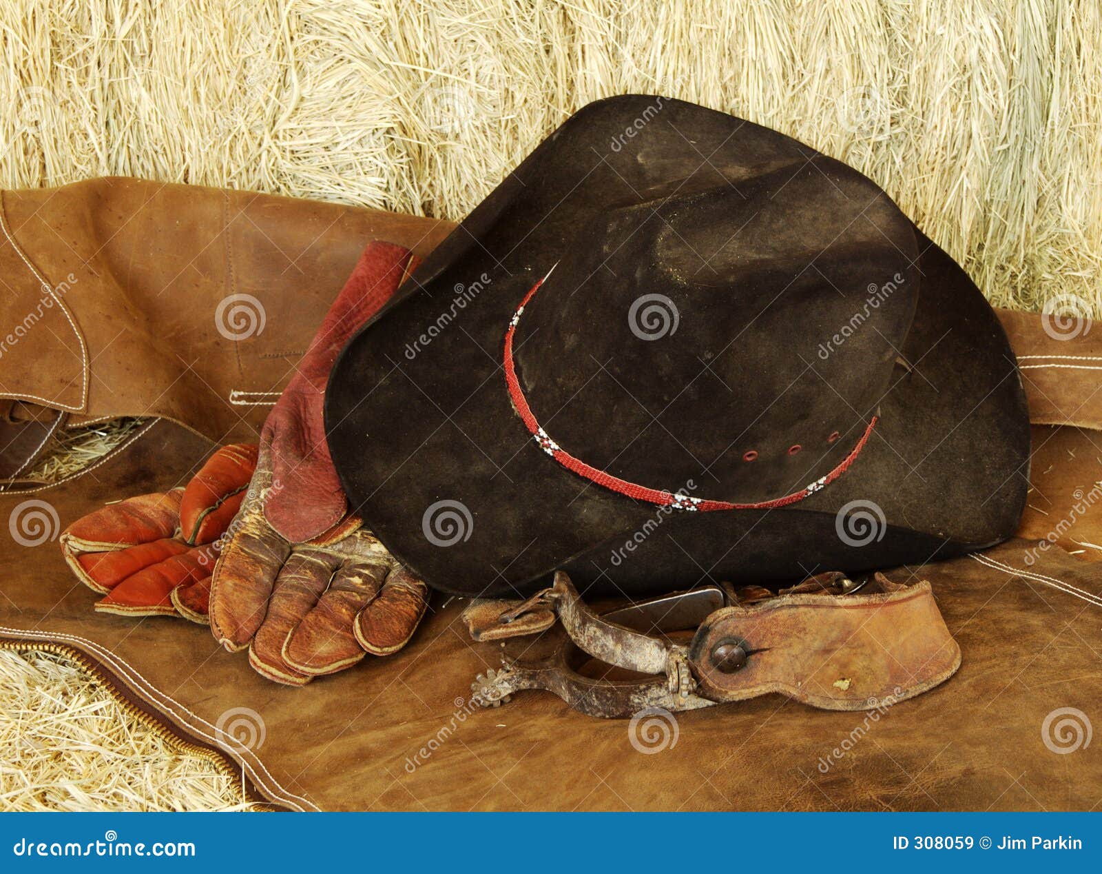 hat, gloves and spurs
