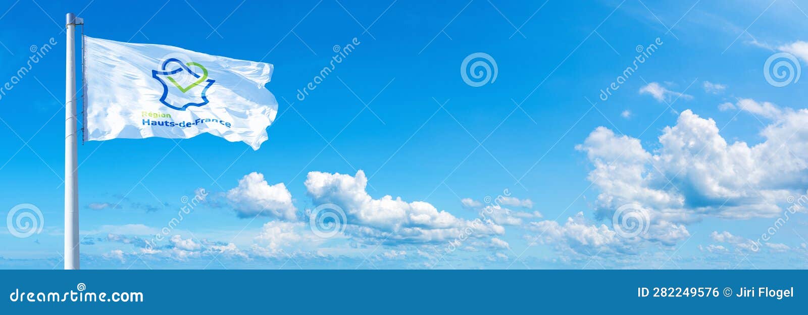 Hauts-de-France Flag - Region of France, Flag Waving on a Blue Sky in ...