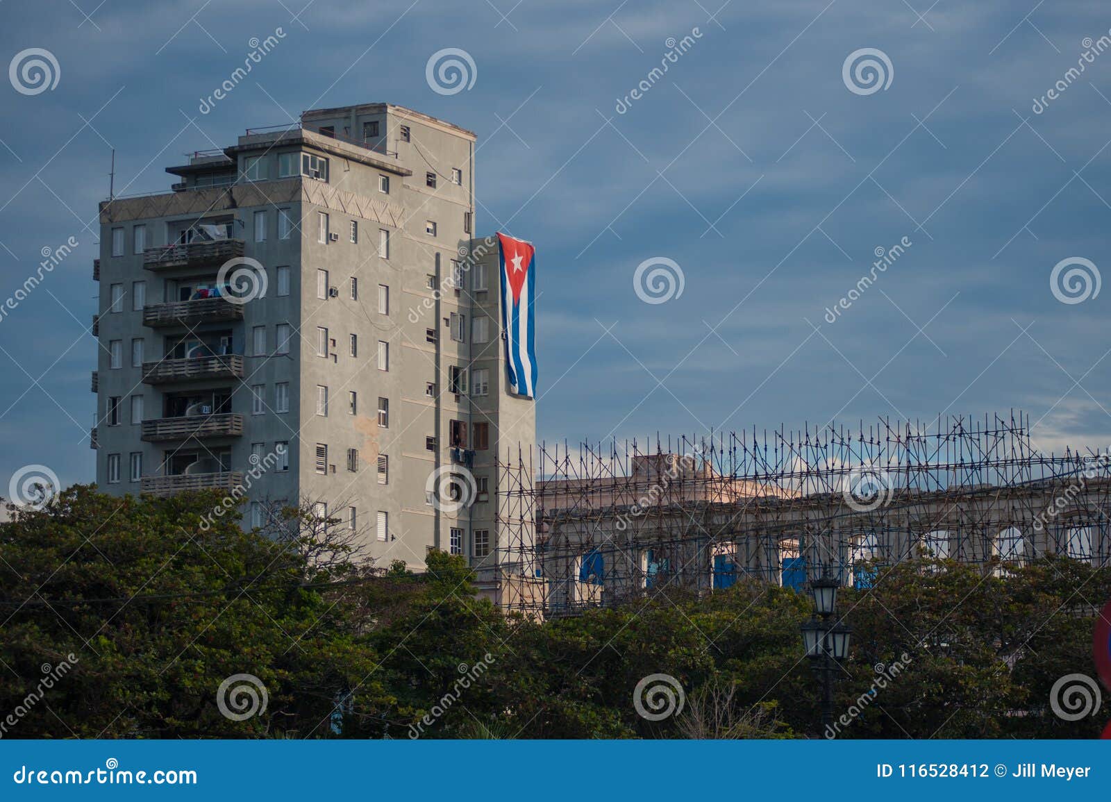 cuban flag hanging on a building
