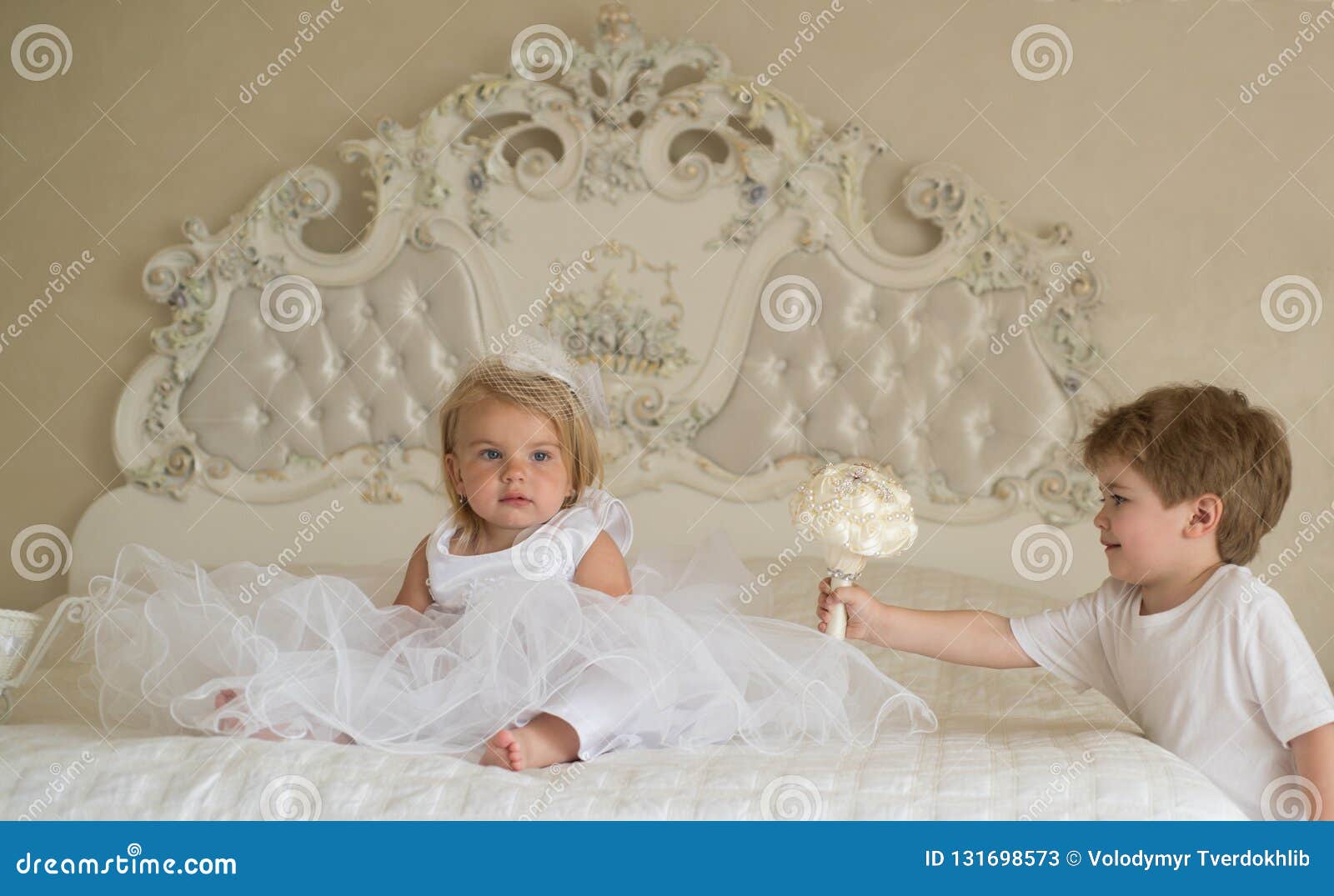 We Have Good Hair. Children Development. Page Boy with Blonde Hairstyle  Hold Wedding Bunch Stock Image - Image of beautiful, sister: 131698573