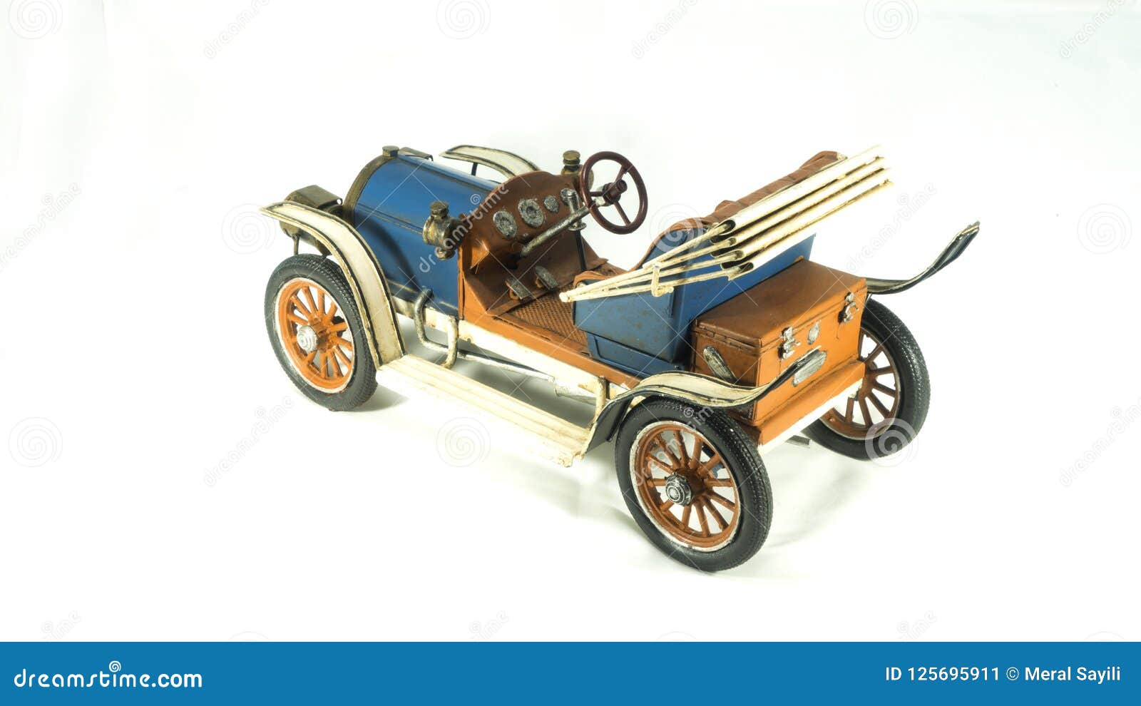 Antique tin old model car stock image. Image of hand 125695911
