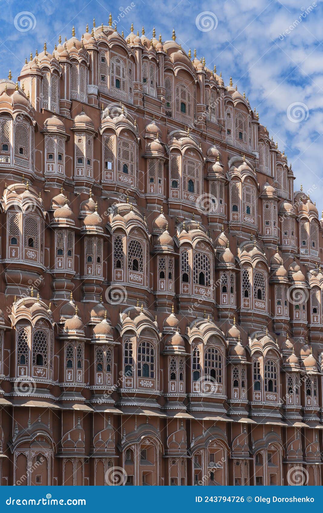 hawa mahal, pink palace of winds in old city jaipur, rajasthan, india. background of indian architecture