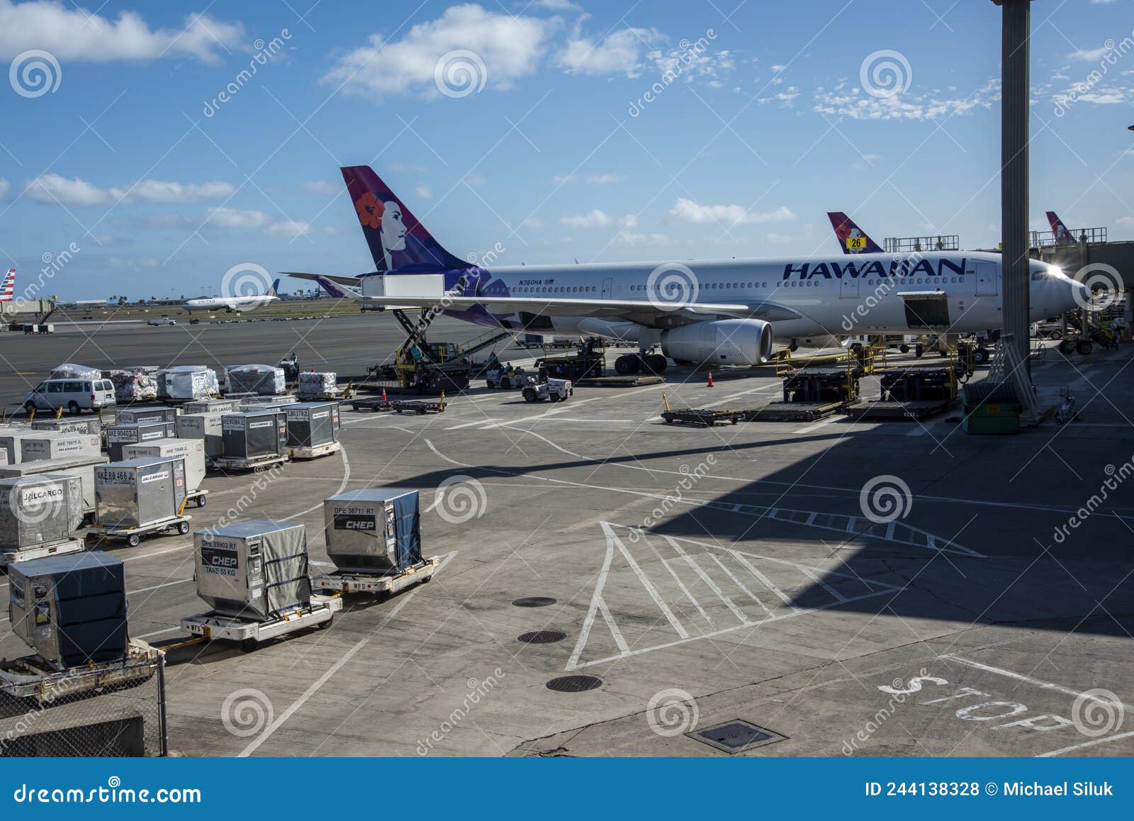 Hawaiian Airlines Airplane Being Fueled and Loaded for the Next Flight ...