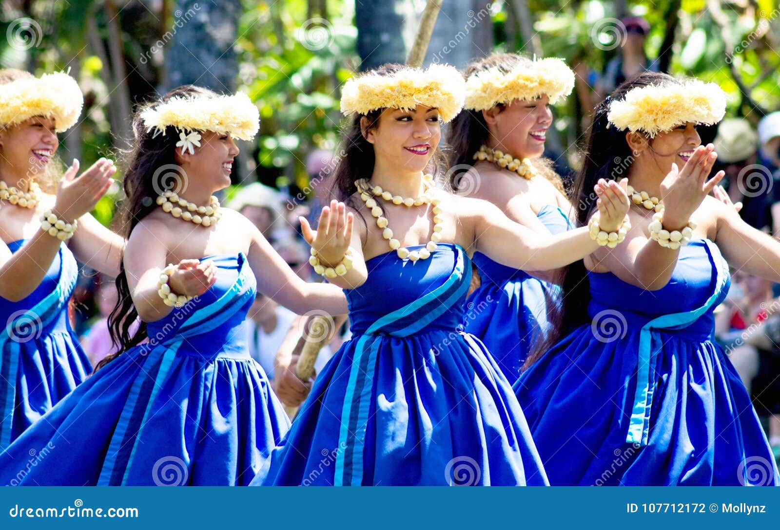 Hawaiian Dancers on a Canoe Float at the Polynesian Cultural
