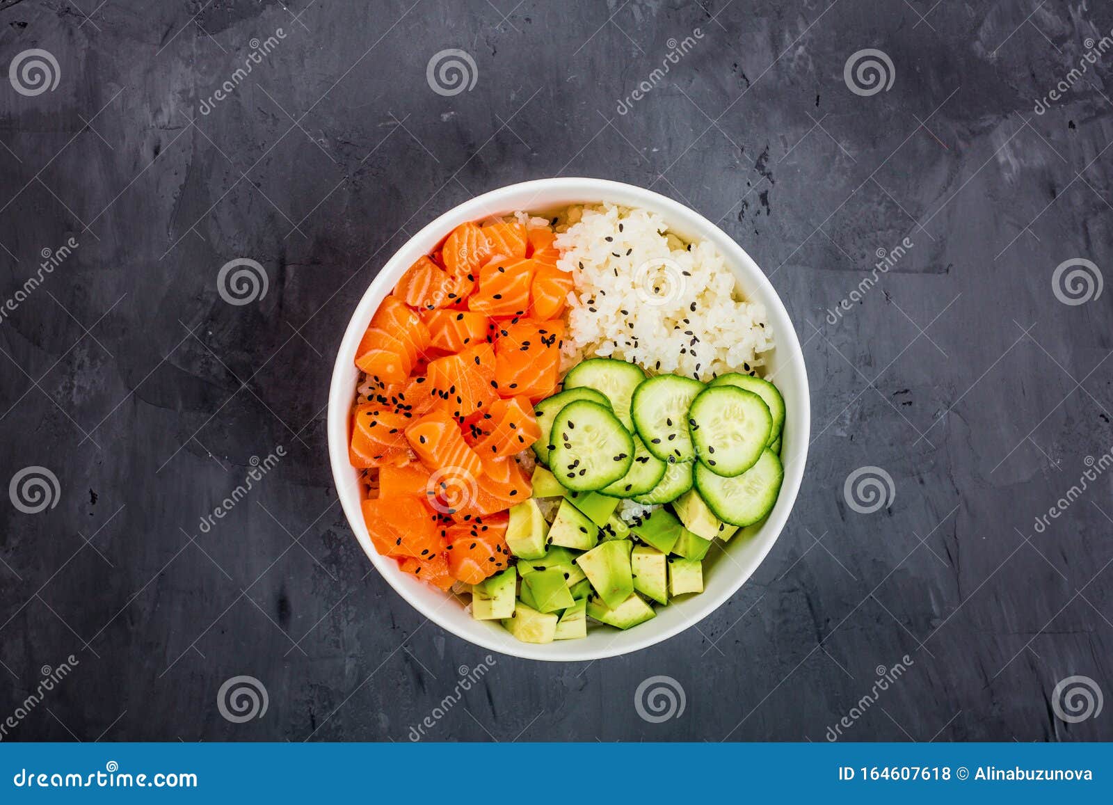 Download Hawaiian Salmon Bowl With Cucumbers, Avocado, Sesame Seeds And Rice. Top View, Overhead, Flat ...
