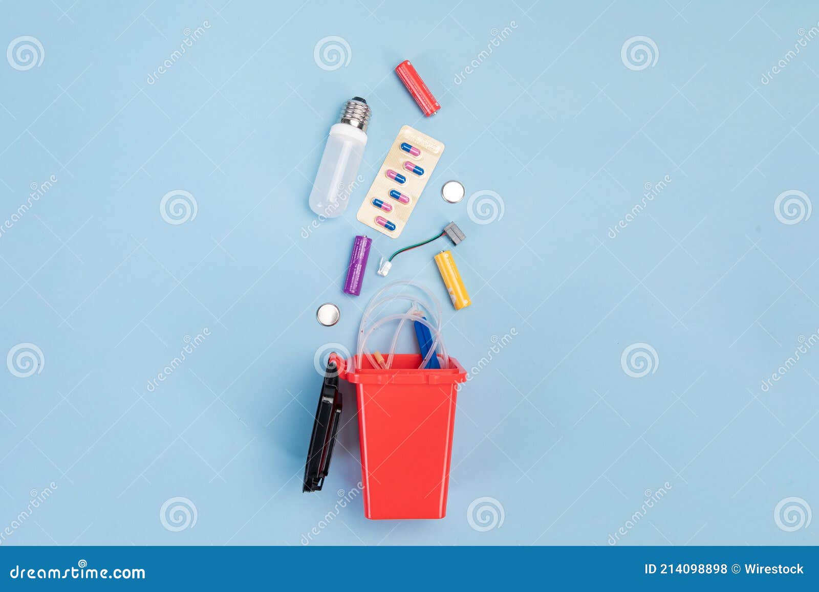 Hazardous Waste and Trash Bin on Blue Background the Concept of Recycling and Sorting of