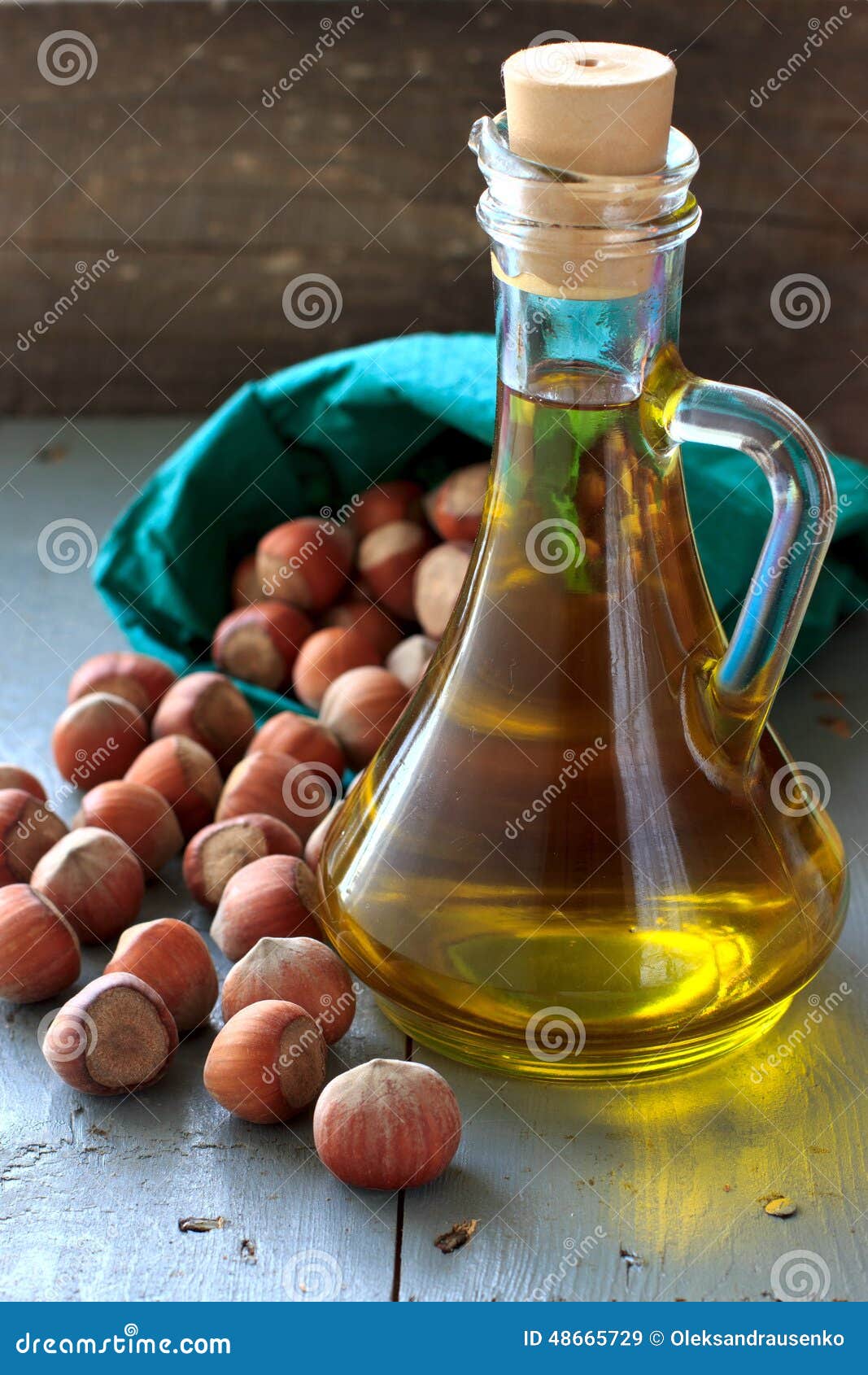 Hazelnut Oil in the Glass Bottle and Nuts Stock Image Image of brown