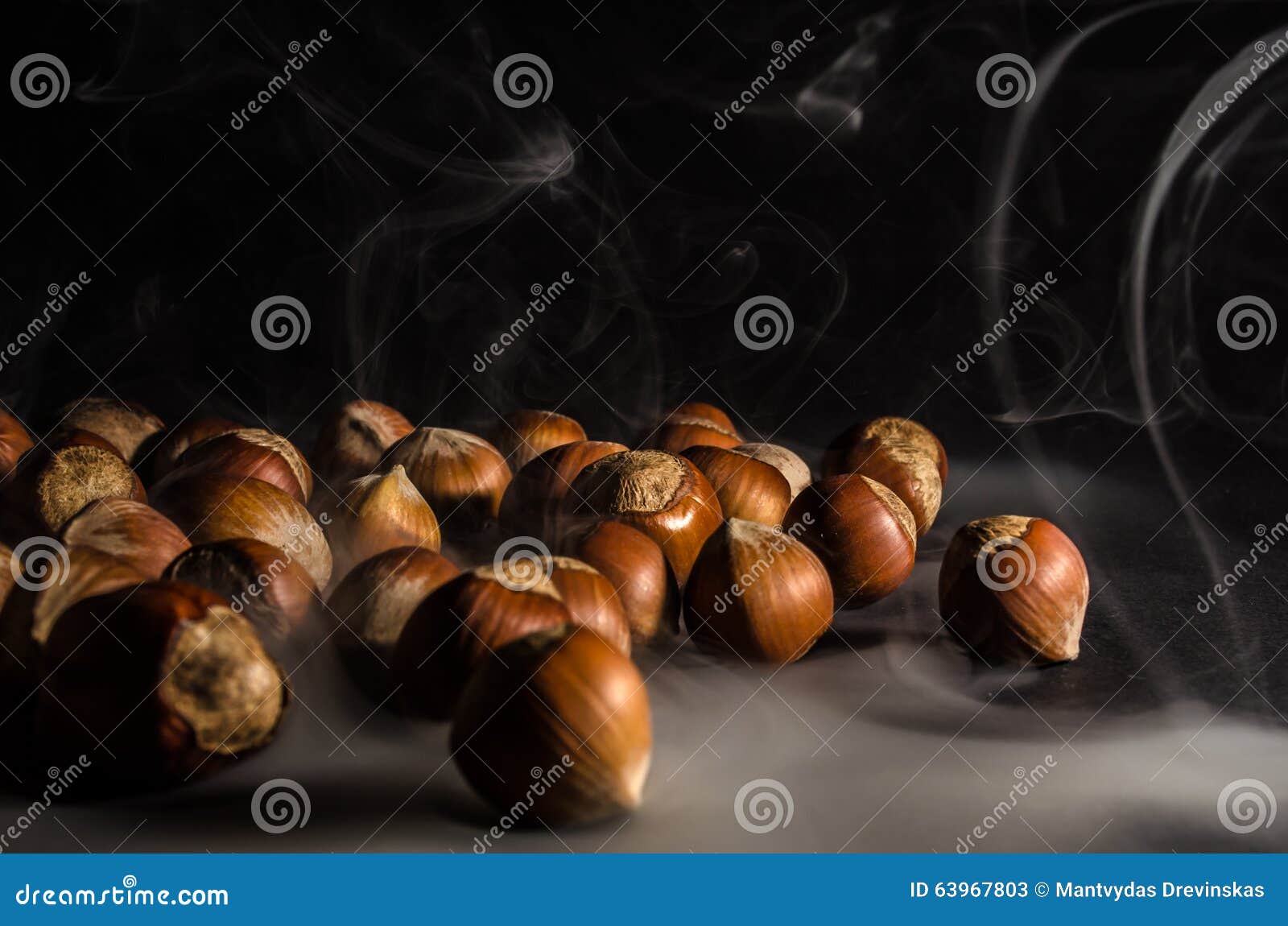 Hazelnuts in smoke stock image. Image of black, food 63967803