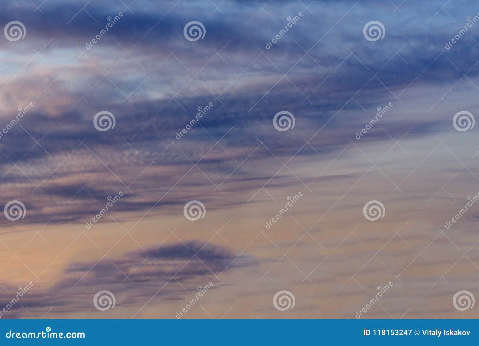 a hazy sunset in an australian sky over the darkened sea at ocean beach, bunbury, western australia in late winter adds fleeting c