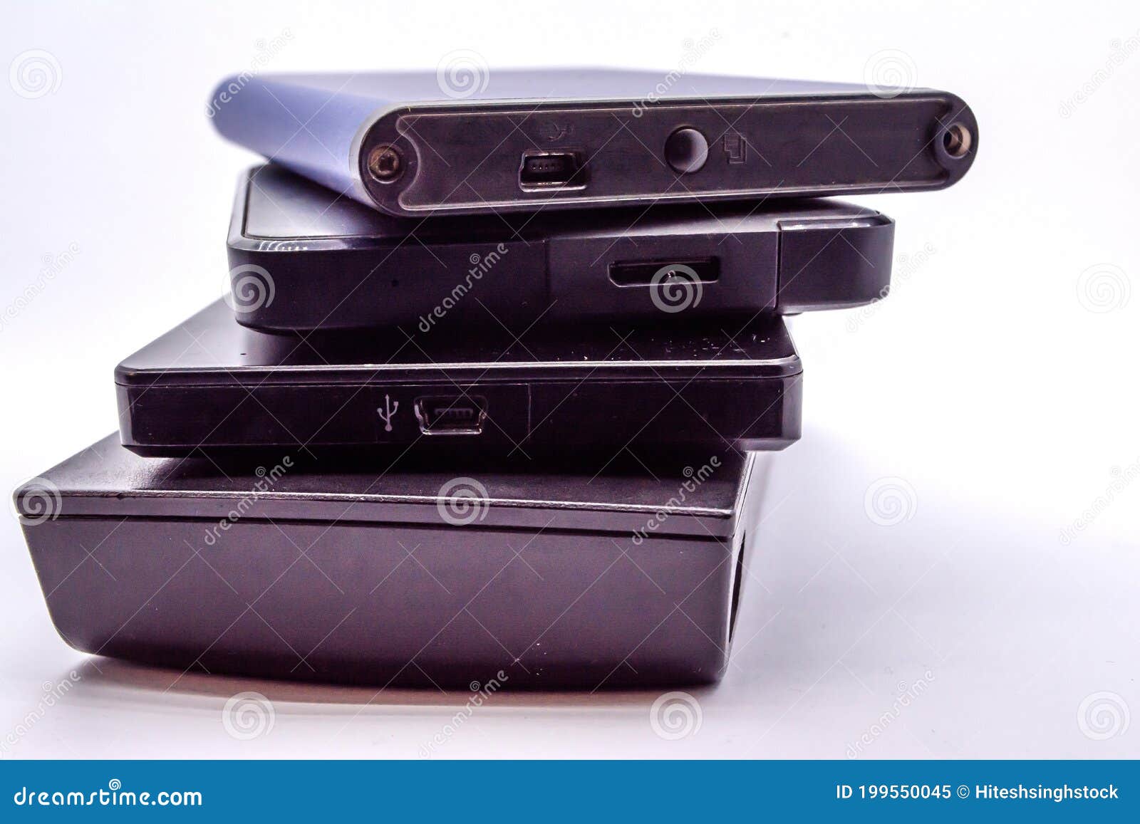 HDD Stack Of External And Internal Laptop Hard Disk Drives Isolated