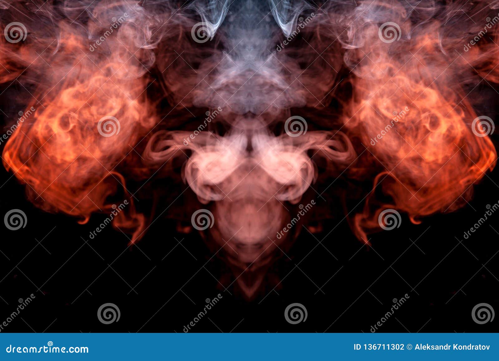 the head of a ghost on a black background from a smoke pattern of an orange-colored vape vaporizing