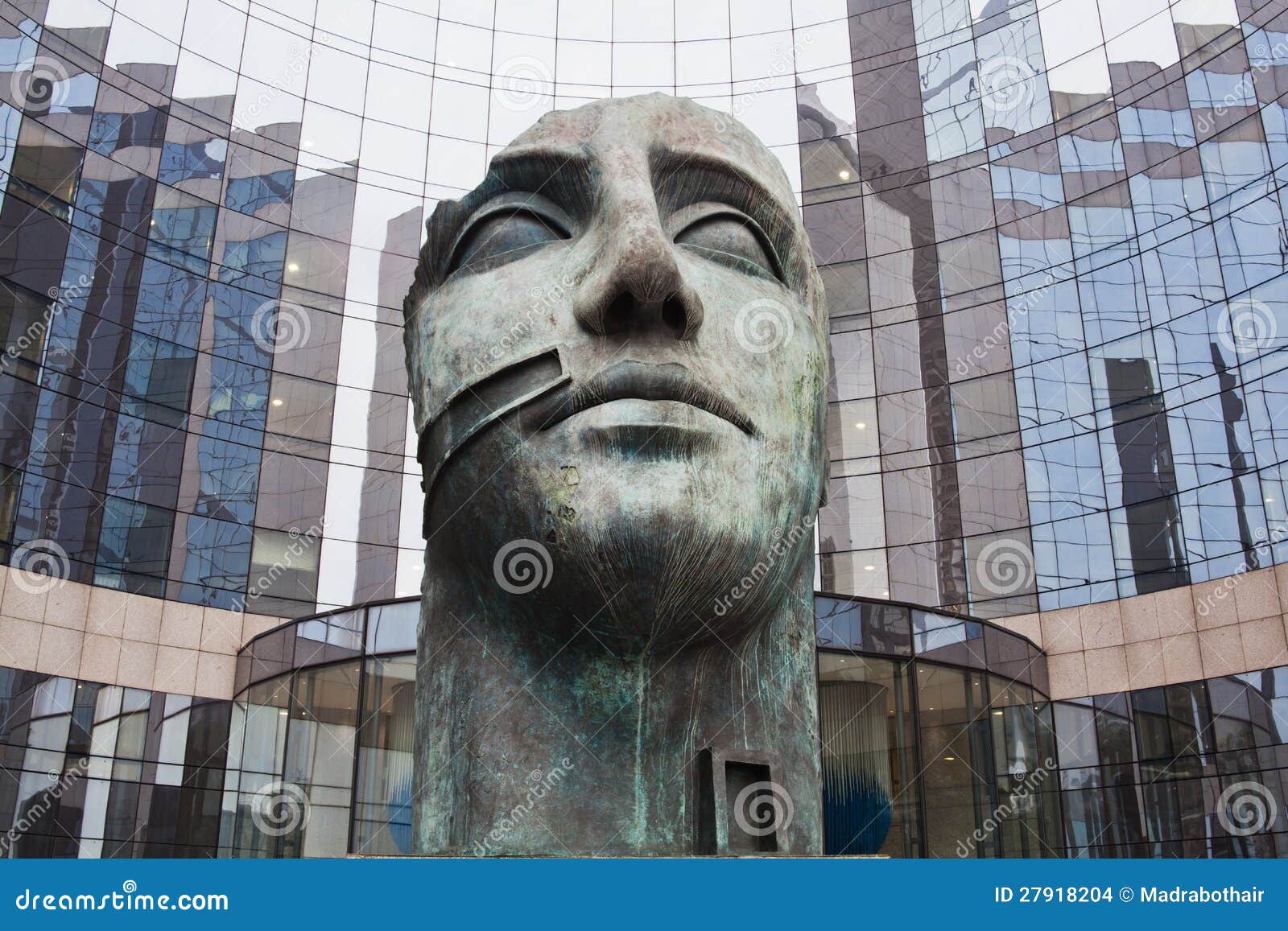 Head Sculpture in Front of a Glass Facade Stock Photo Image of front