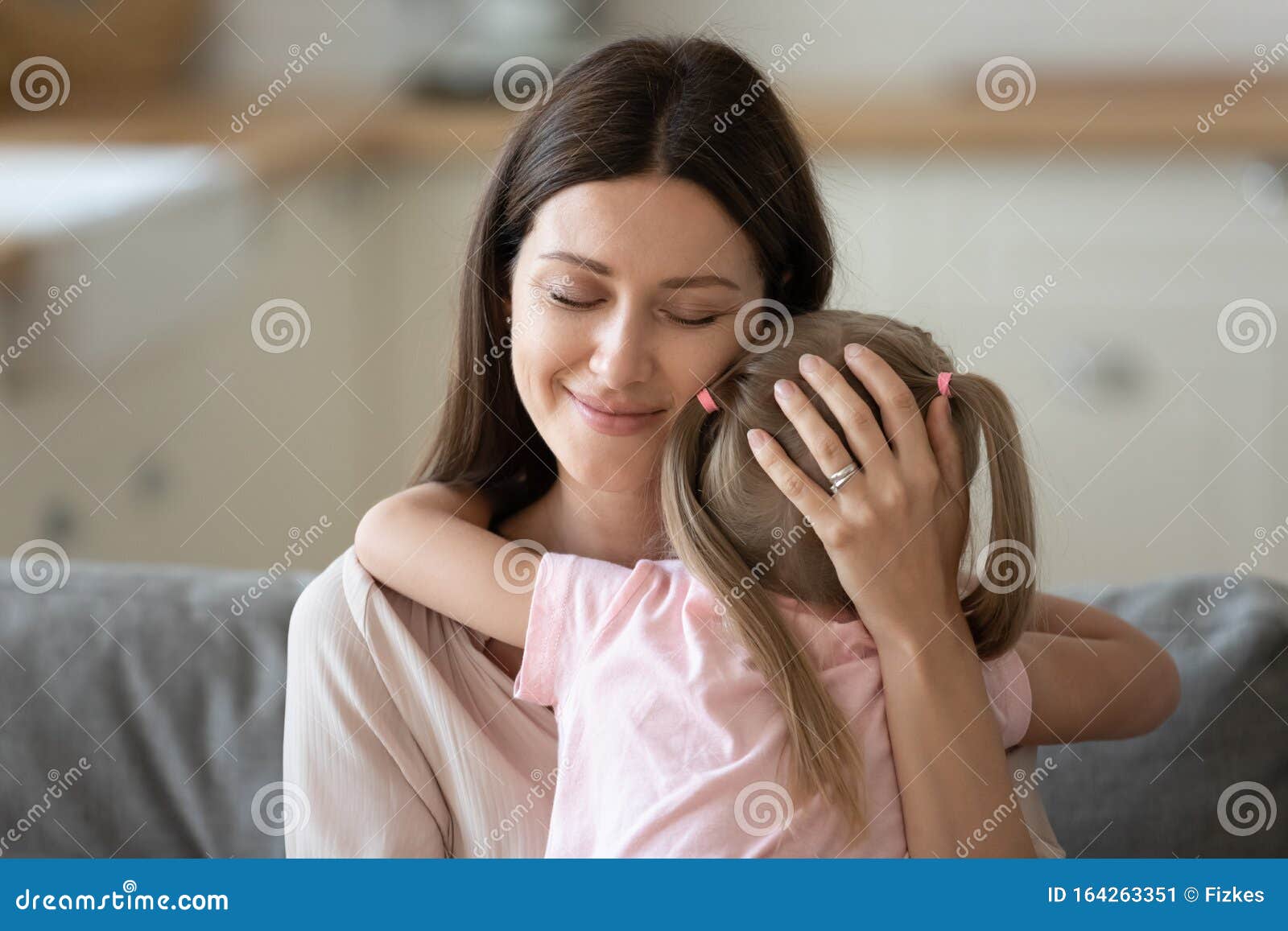 Happy Pleasant Mommy Cuddling Small Preschooler Daughter Stock Image 