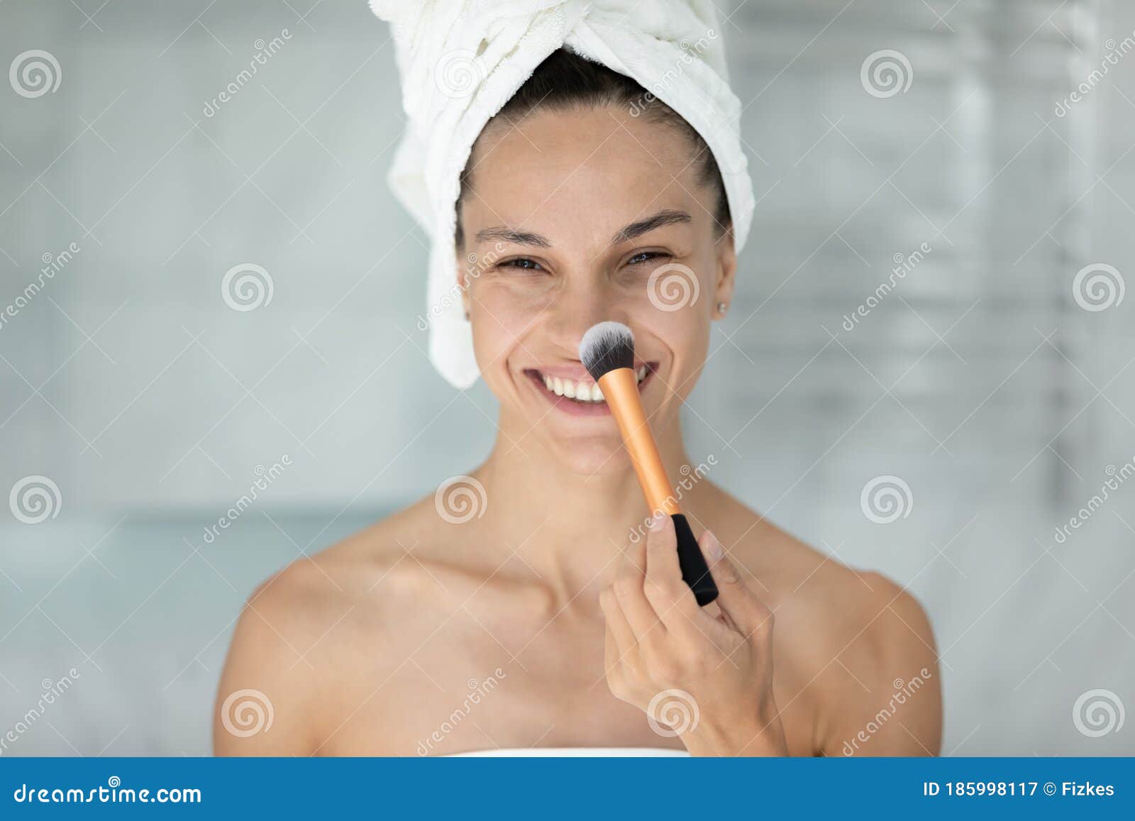 Head Shot Portrait Smiling Woman Using Cosmetics Brush