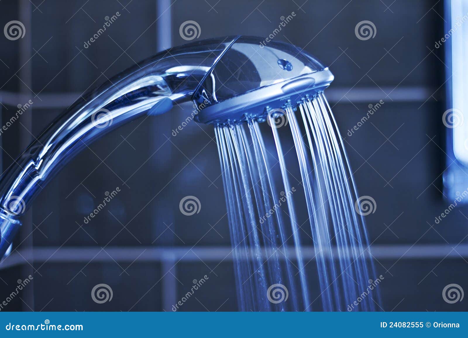 Head shower while running water in blue