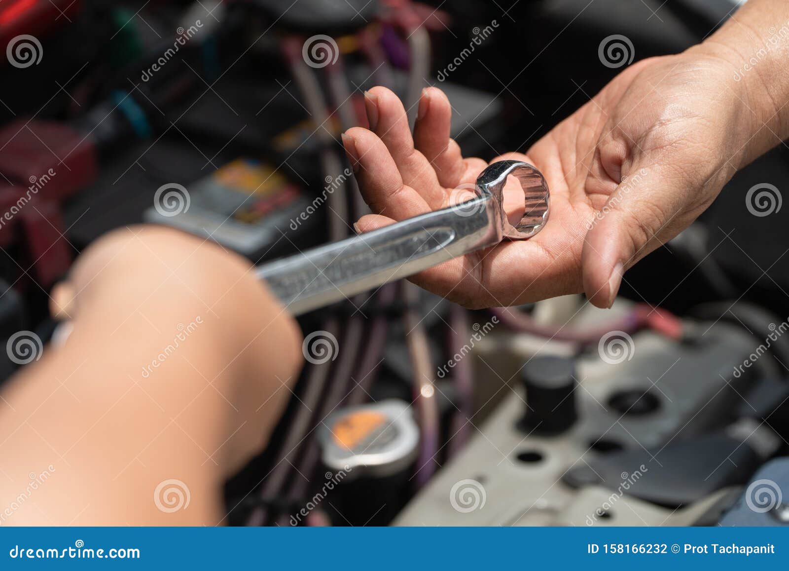 The Head of Technician the Car Engine Repairman Service is Sending a