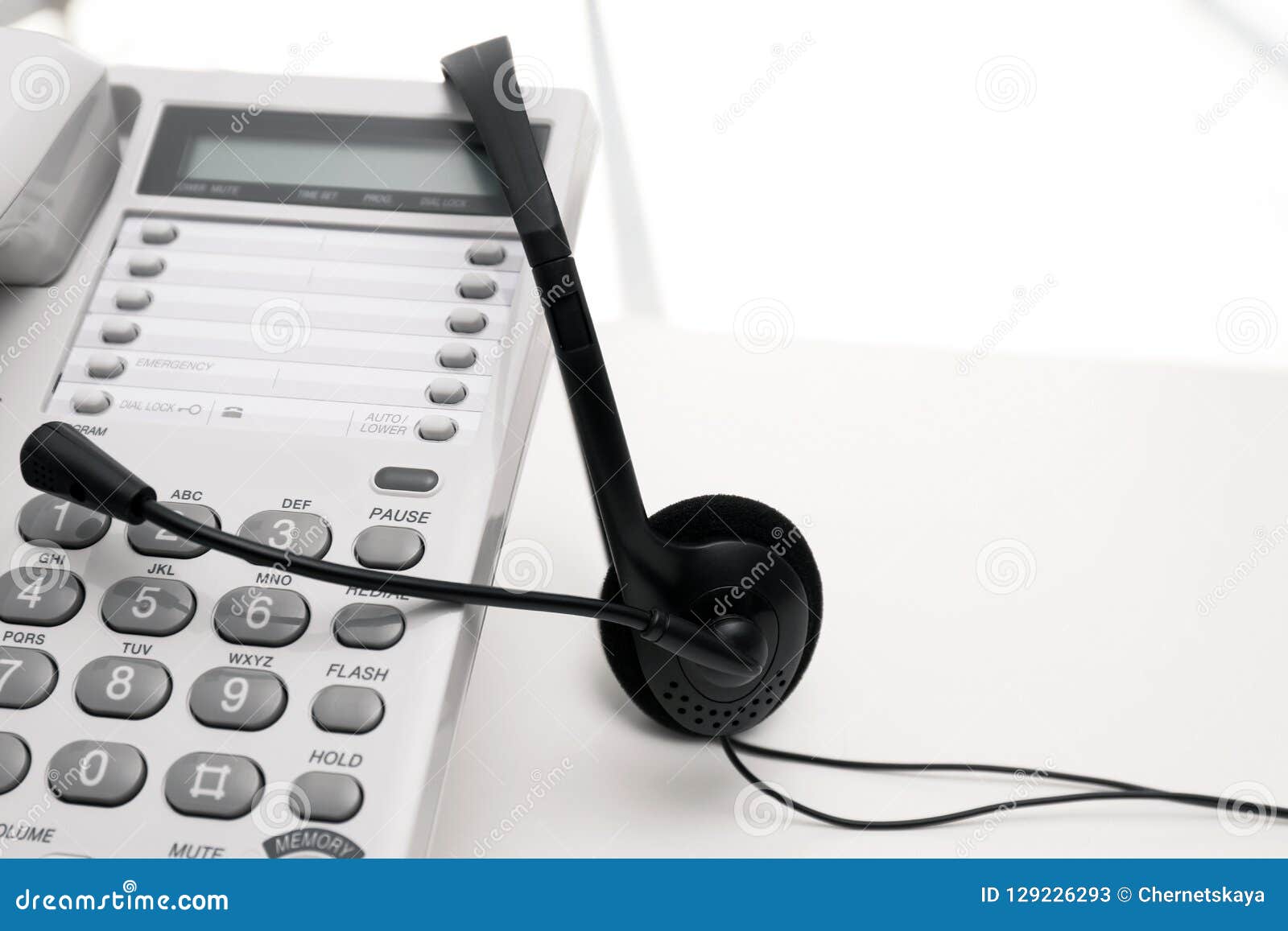 Headset And Desk Phone On Table Space For Text Stock Image