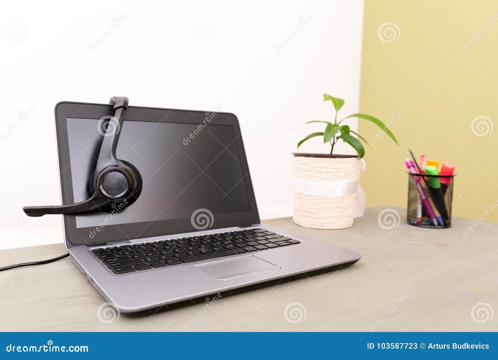 Headset On Laptop Computer Concept For Communication It Support