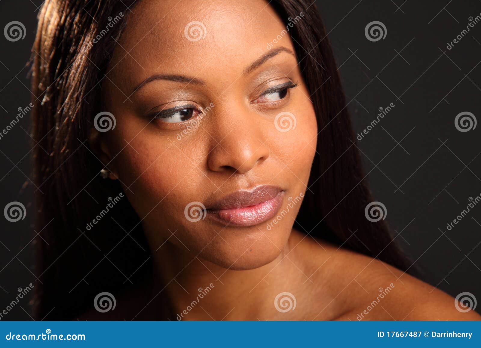 headshot of beautiful serene black woman