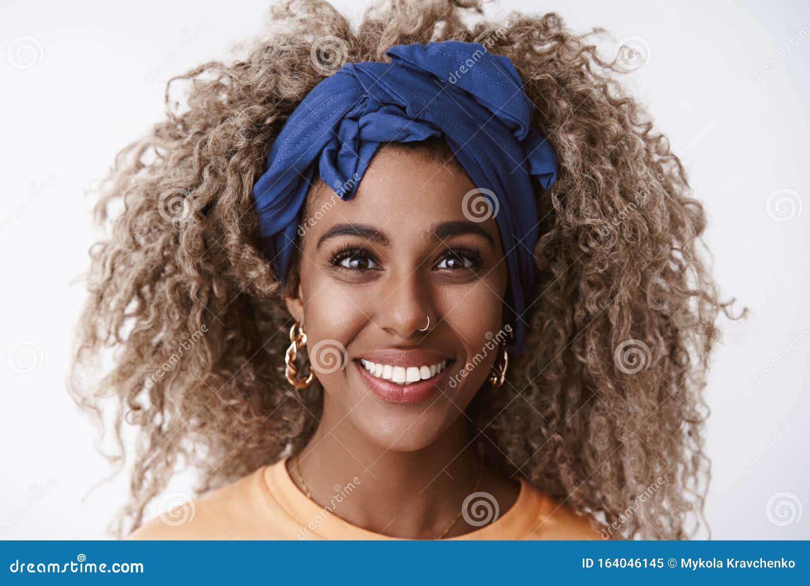 Headshot Lively and Enthusiastic, Carefree Stylish African-american  Curly-haired Blond Female in Blue Hipster Headband Stock Image - Image of  girlfriend, confident: 164046145