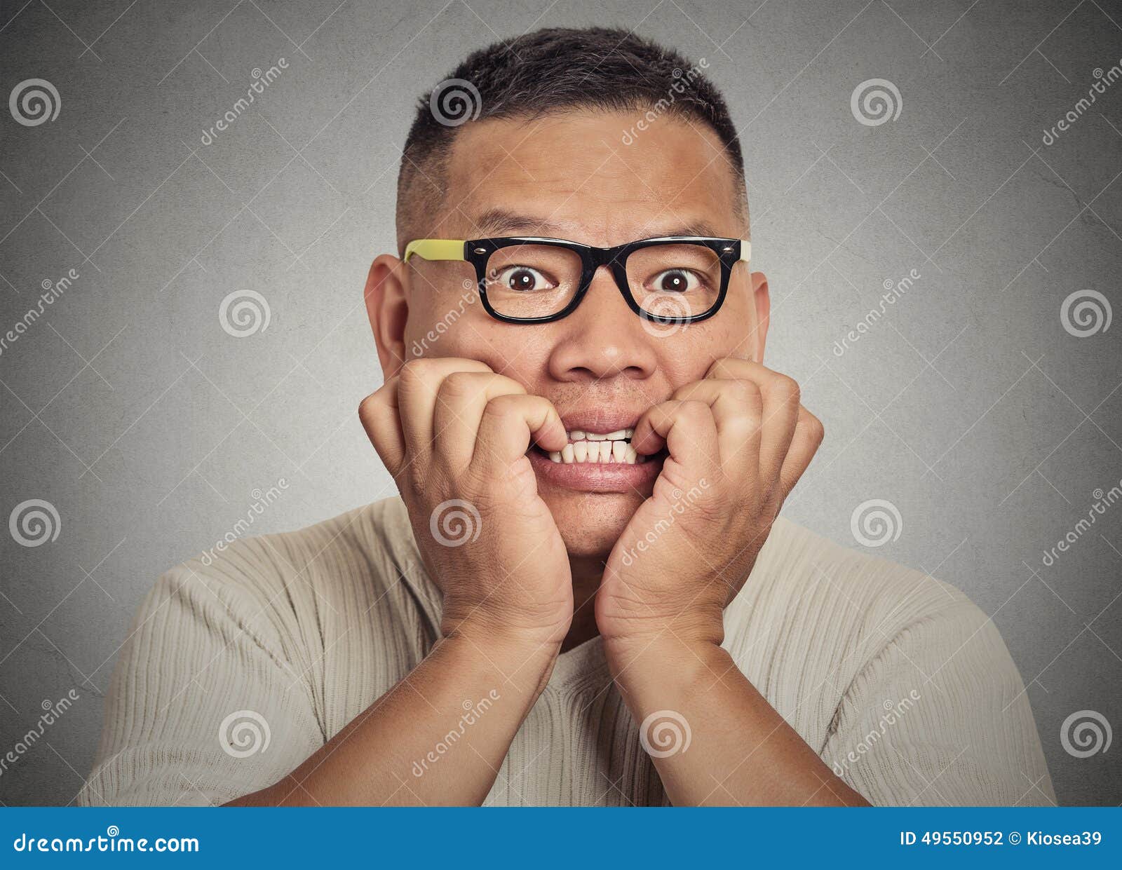 headshot-nerdy-guy-glasses-biting-his-nails-looking-anxious-craving-closeup-portrait-young-you-something-49550952.jpg