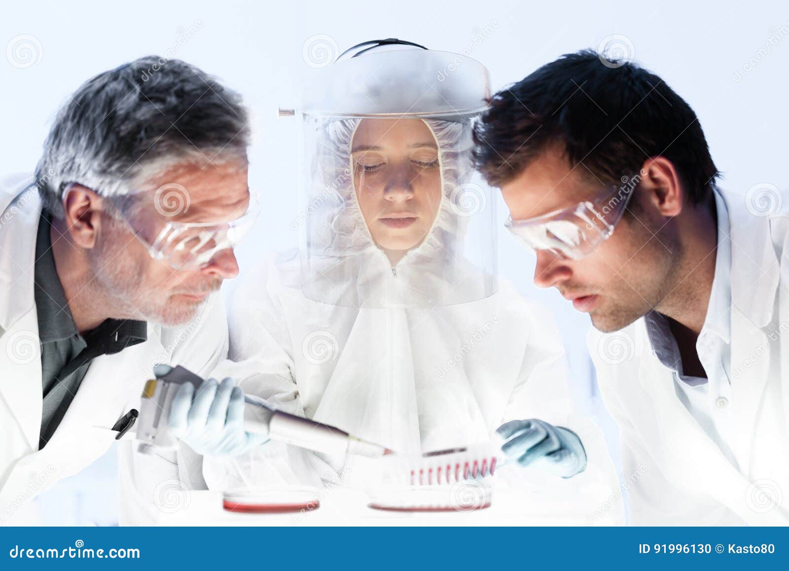 health care researchers working in scientific laboratory.