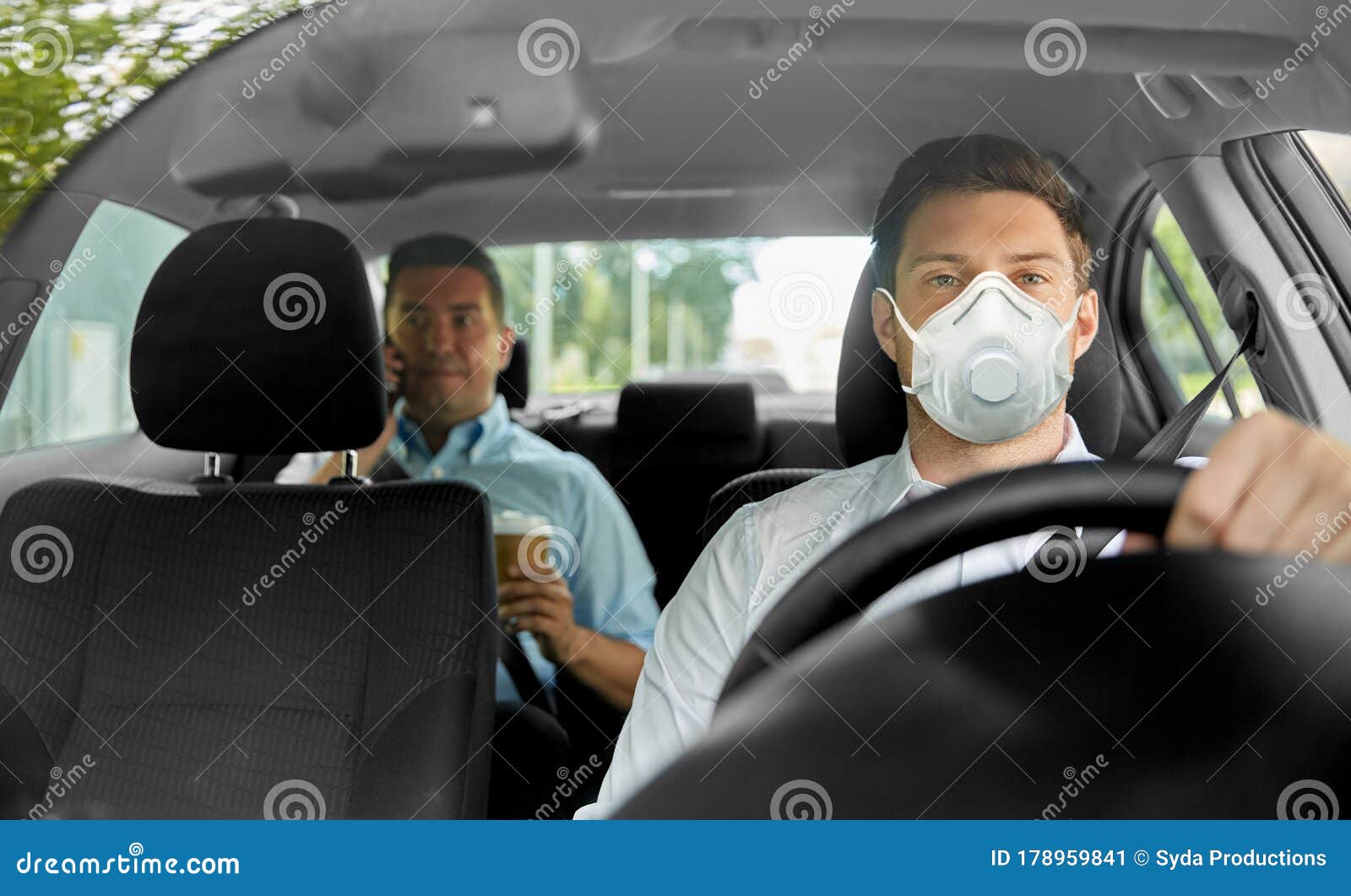 Taxi Driver In Mask Driving Car With Passenger Stock Image Image Of
