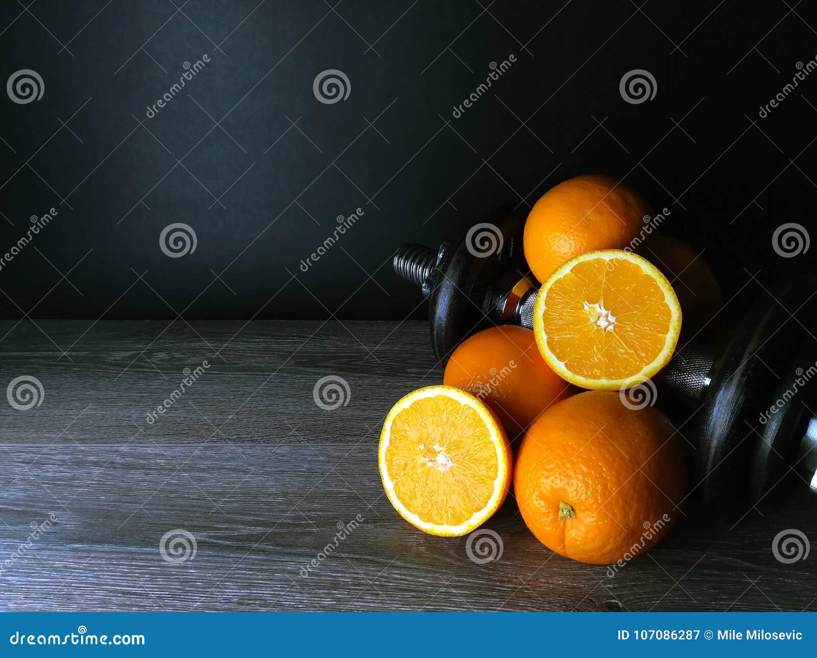 orange with weights, health and fitness