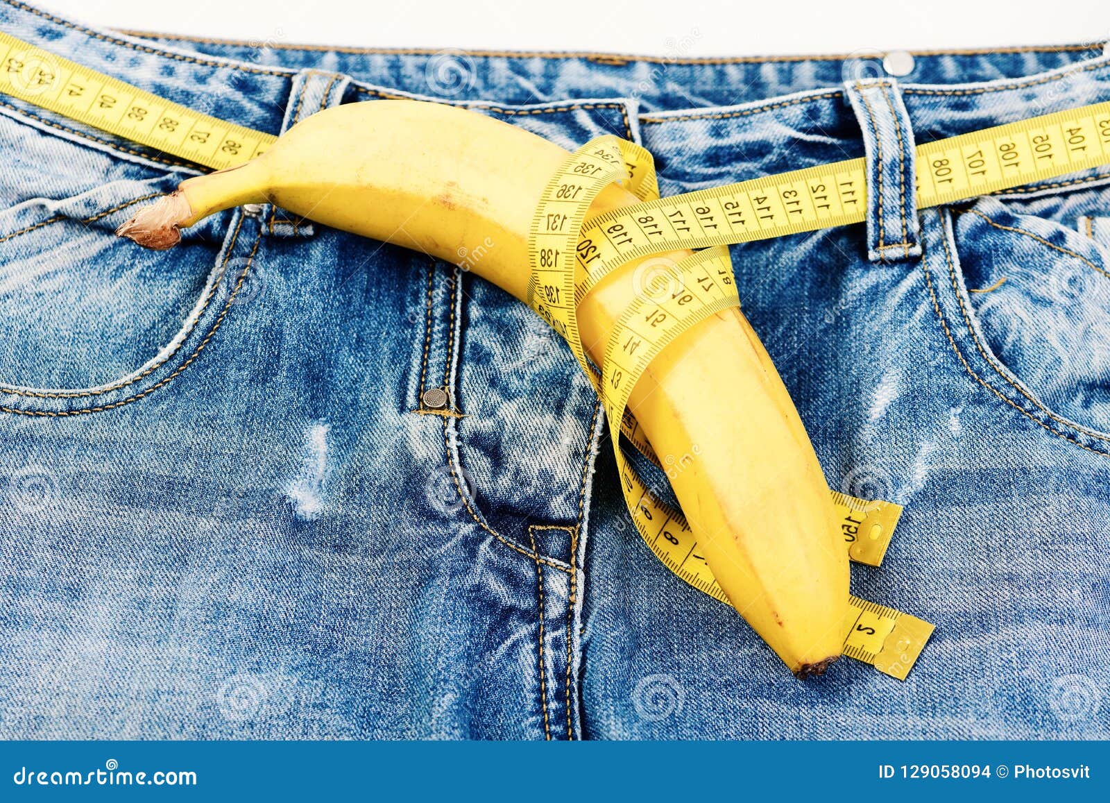 health and male sexuality concept: jeans crotch and banana