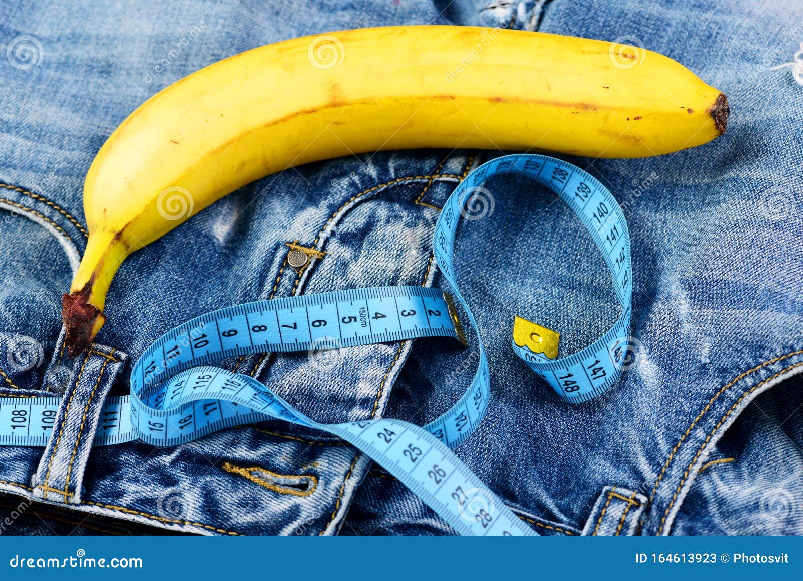Kinky Fruit with Blue Measure Tape on Jeans, Close Up Stock Image - Image  of focus, beltloop: 164613923