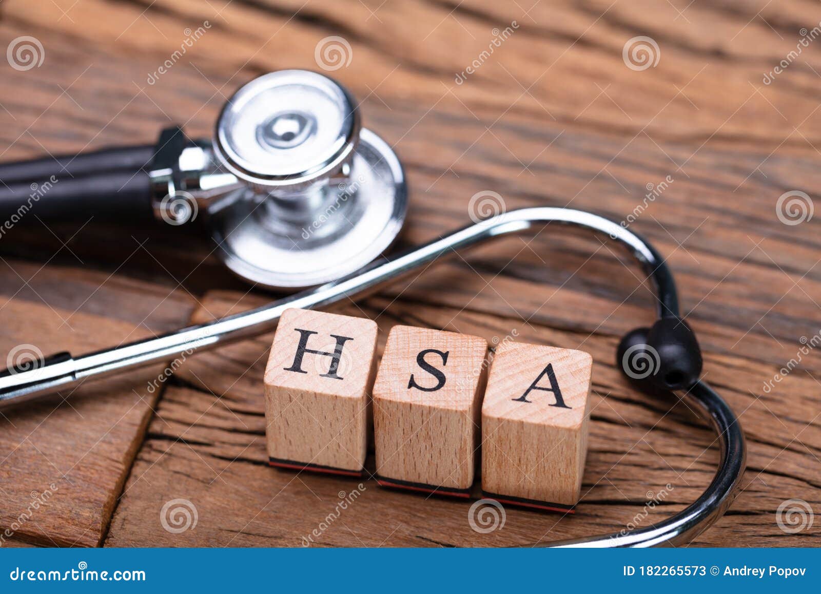 health savings account letters near stethoscope