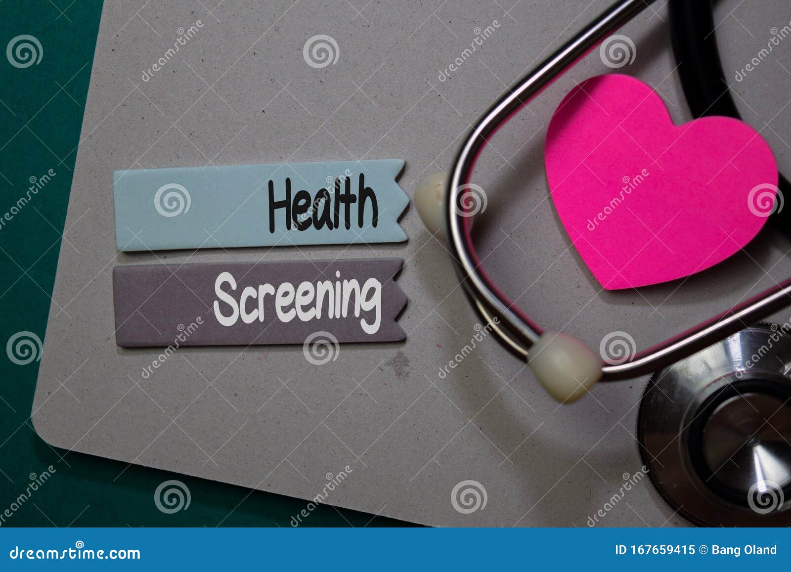 health screening write on stick note  on office desk. healthcare concept