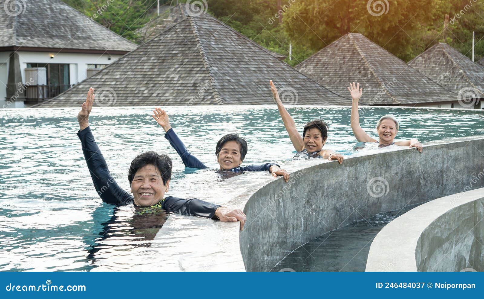 Healthy Asian Elderly Aging Senior Old Friends Exercising In Swimming Pool Having Fun Enjoying