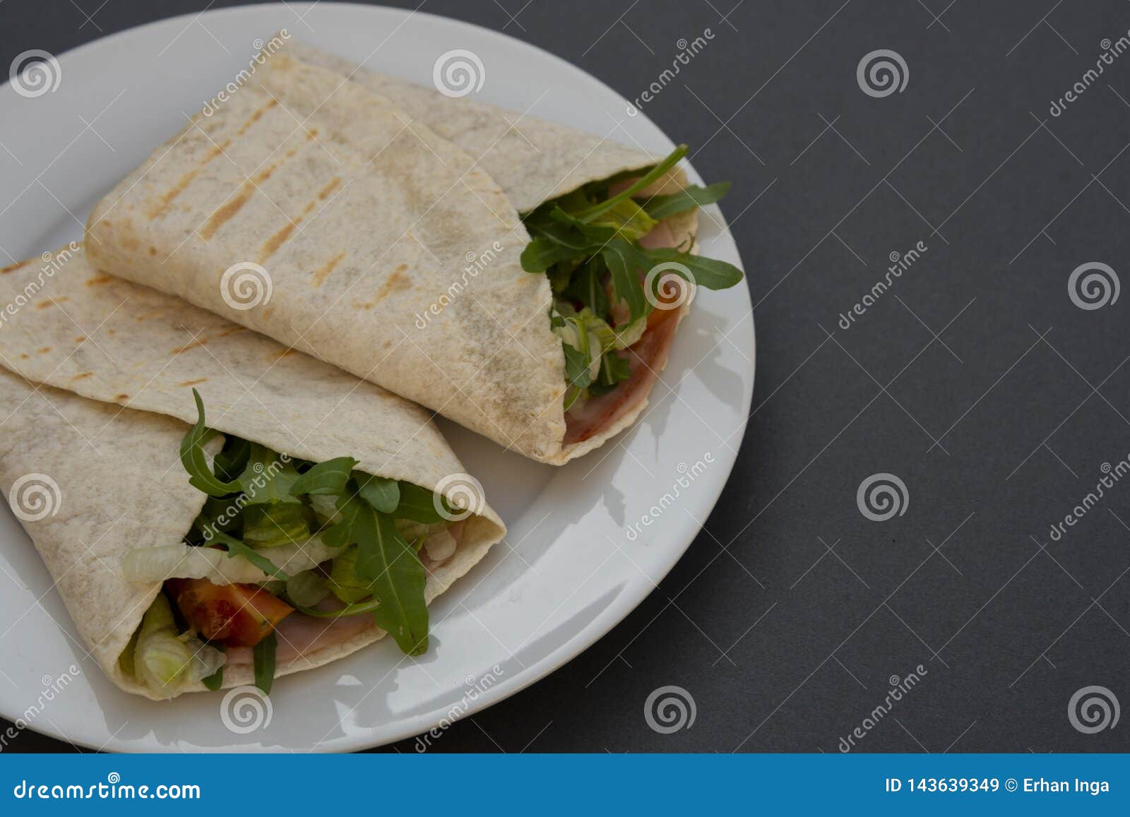healthy avocado and vegetables burrito, wraps, rolles. healthy breakfast or snack. avocado sandwich. copy space