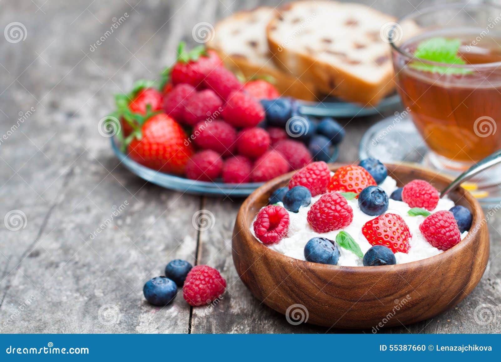 Healthy Breakfast Cottage Cheese with Berries and Melissa Tea Stock