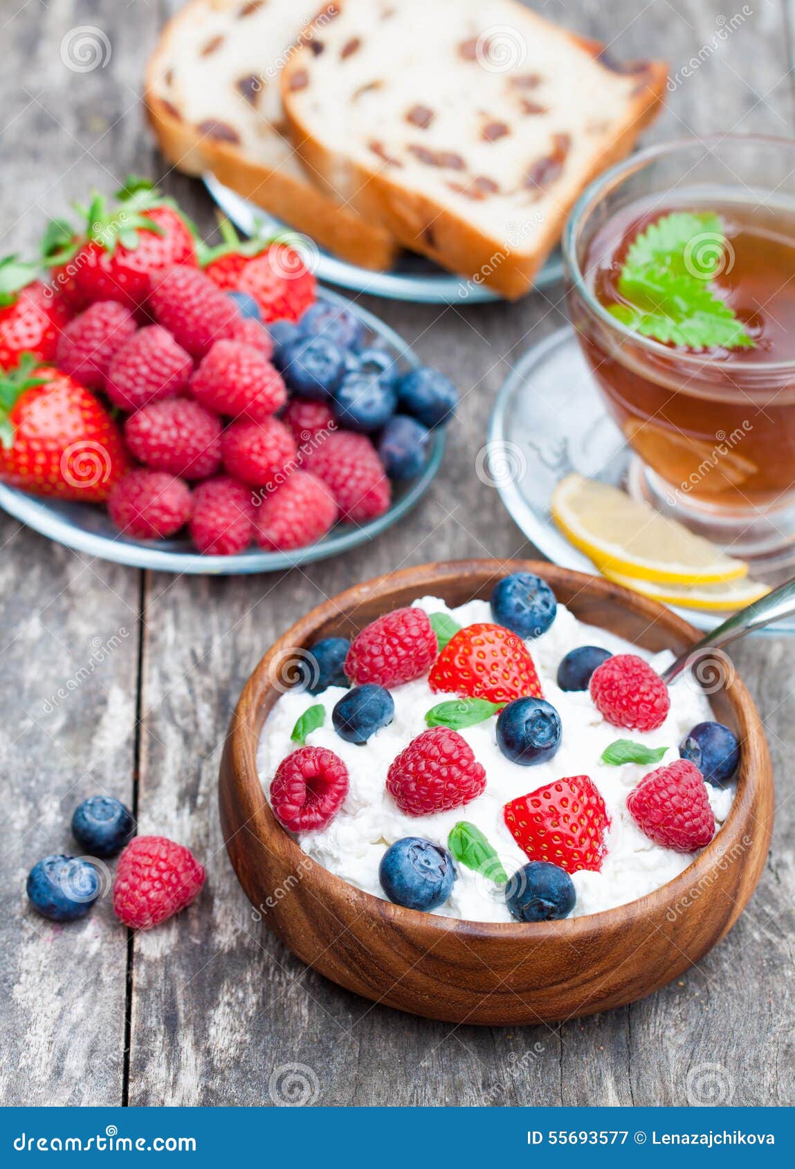 Healthy Breakfast Cottage Cheese with Berries and Melissa Tea Stock