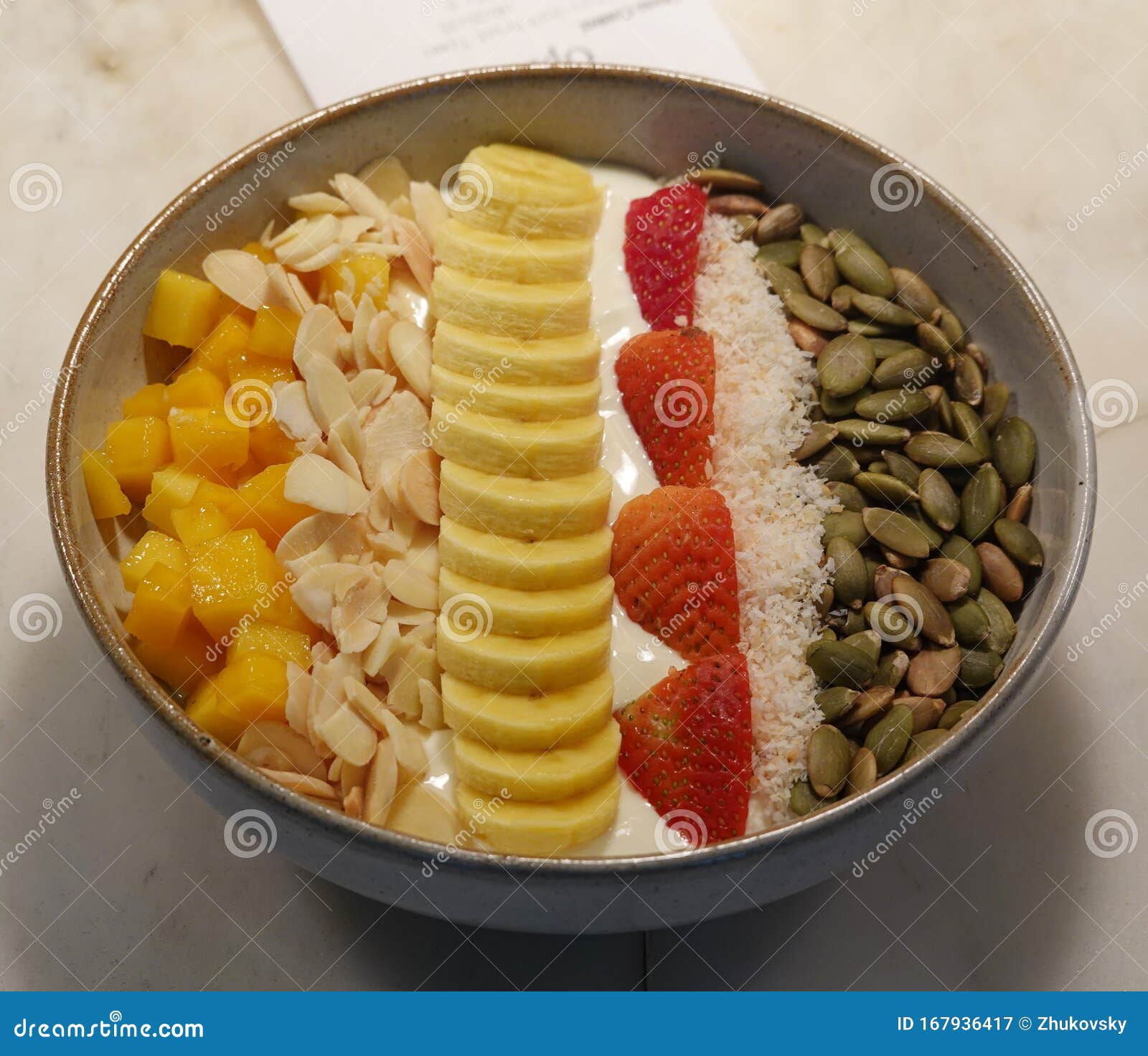 Healthy Breakfast. Fresh Yogurt with Fruits and Nuts Stock Image