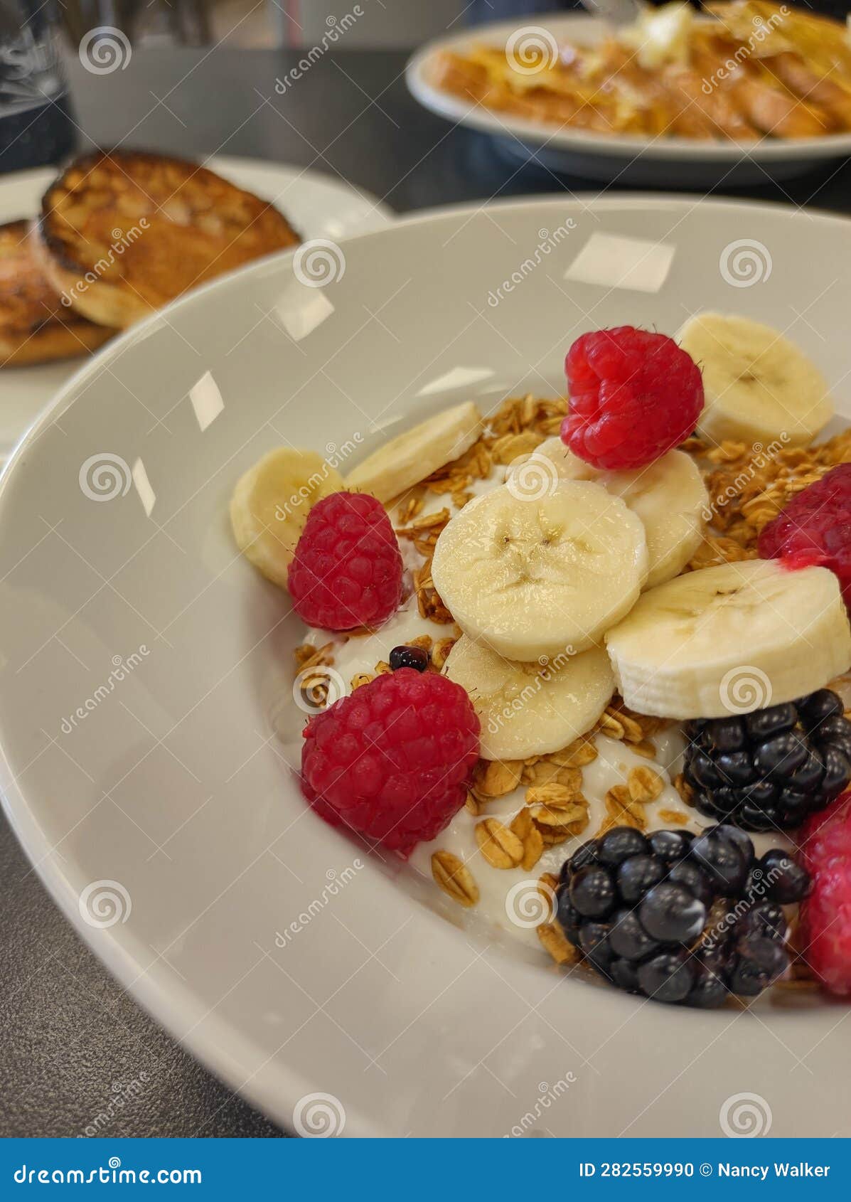 A Healthy Breakfast of Yogurt Granola and Fruits Stock Photo - Image of