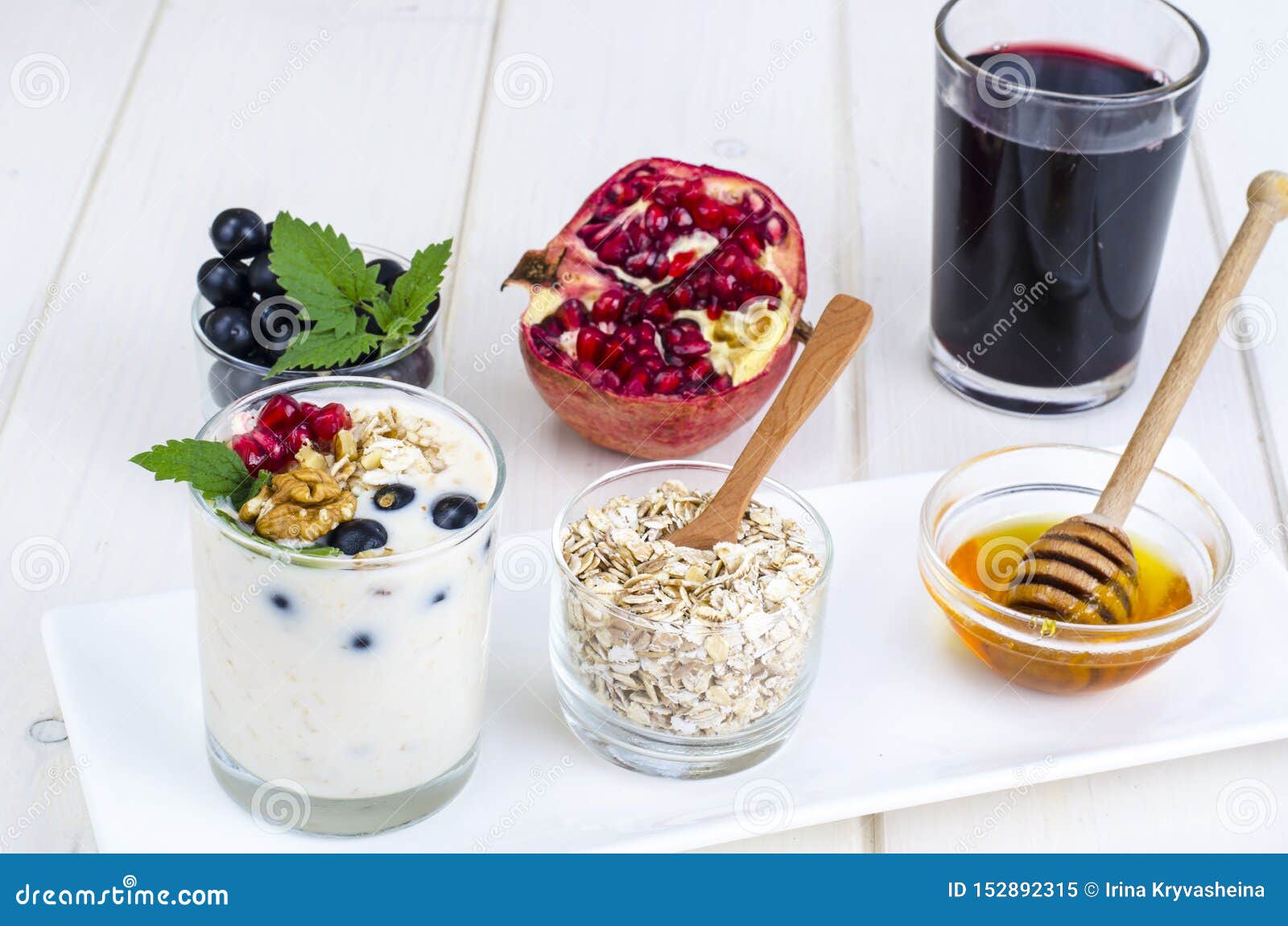 Healthy Breakfast with Yogurt, Juice, Fruits and Berries Stock Image