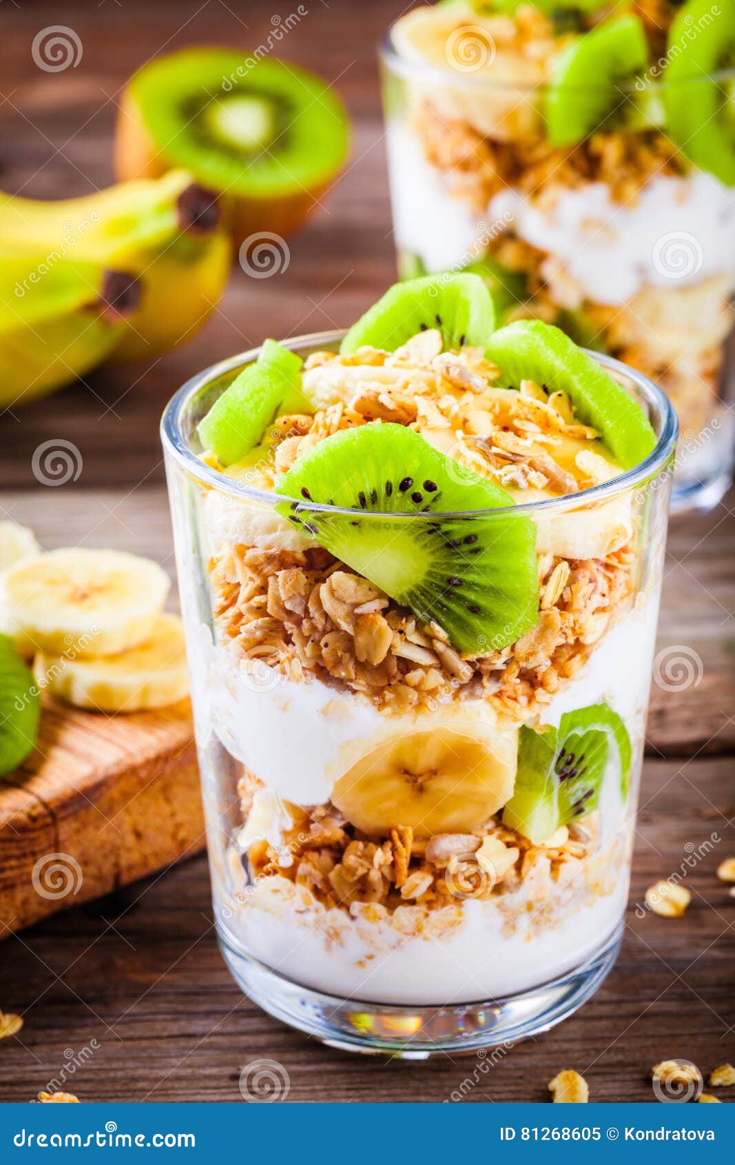 Healthy Breakfast: Yogurt Parfait with Granola, Banana and Kiwi Stock