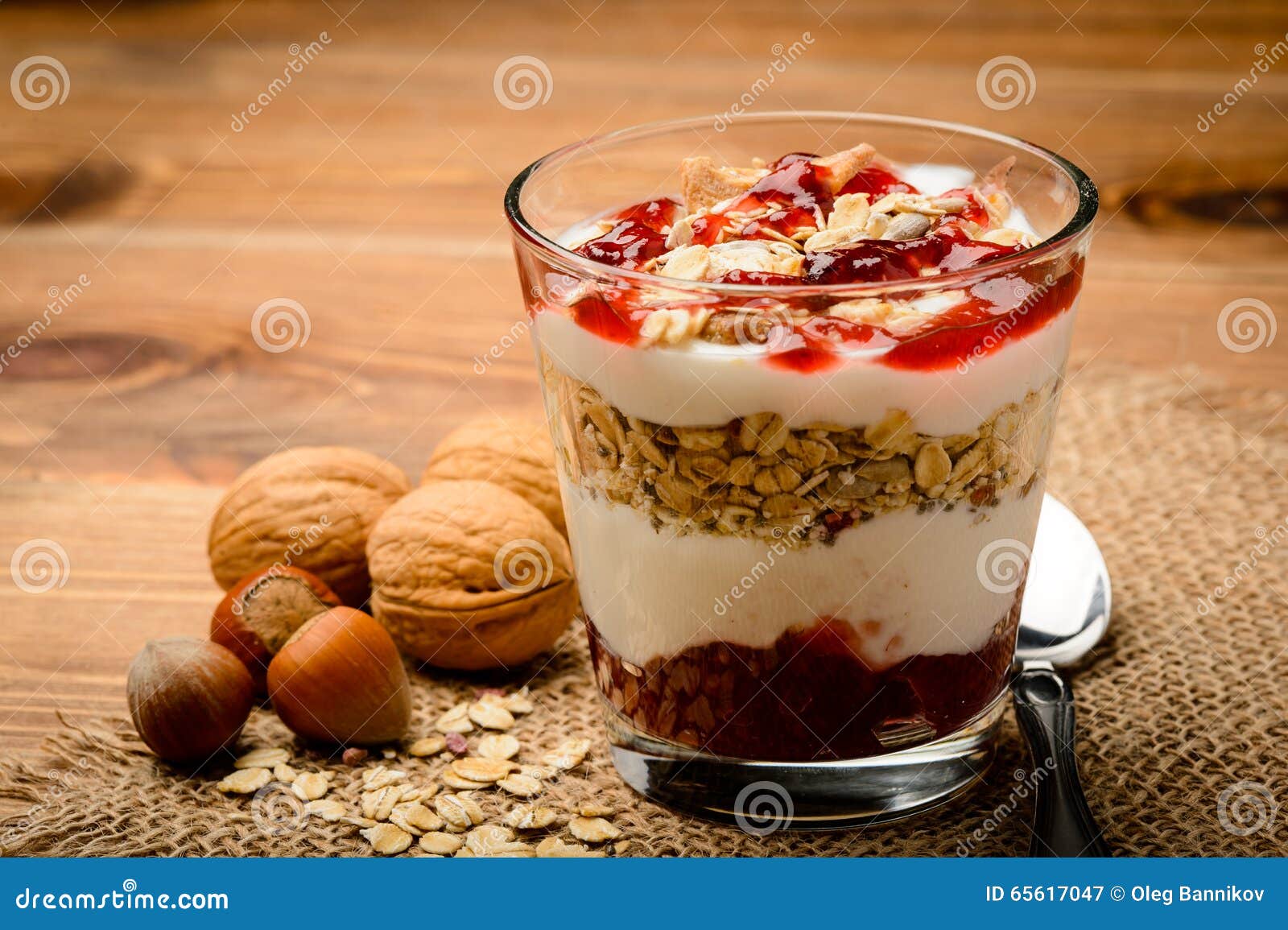 Healthy Dessert with Muesli, Nuts and Raspberry Jam. Stock Image